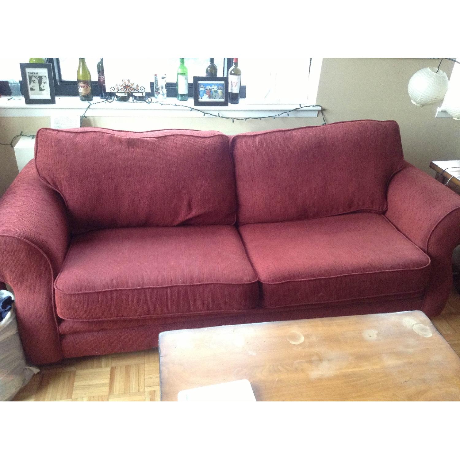 Red Plush Couch With Pull Out Queen Sized Bed Aptdeco