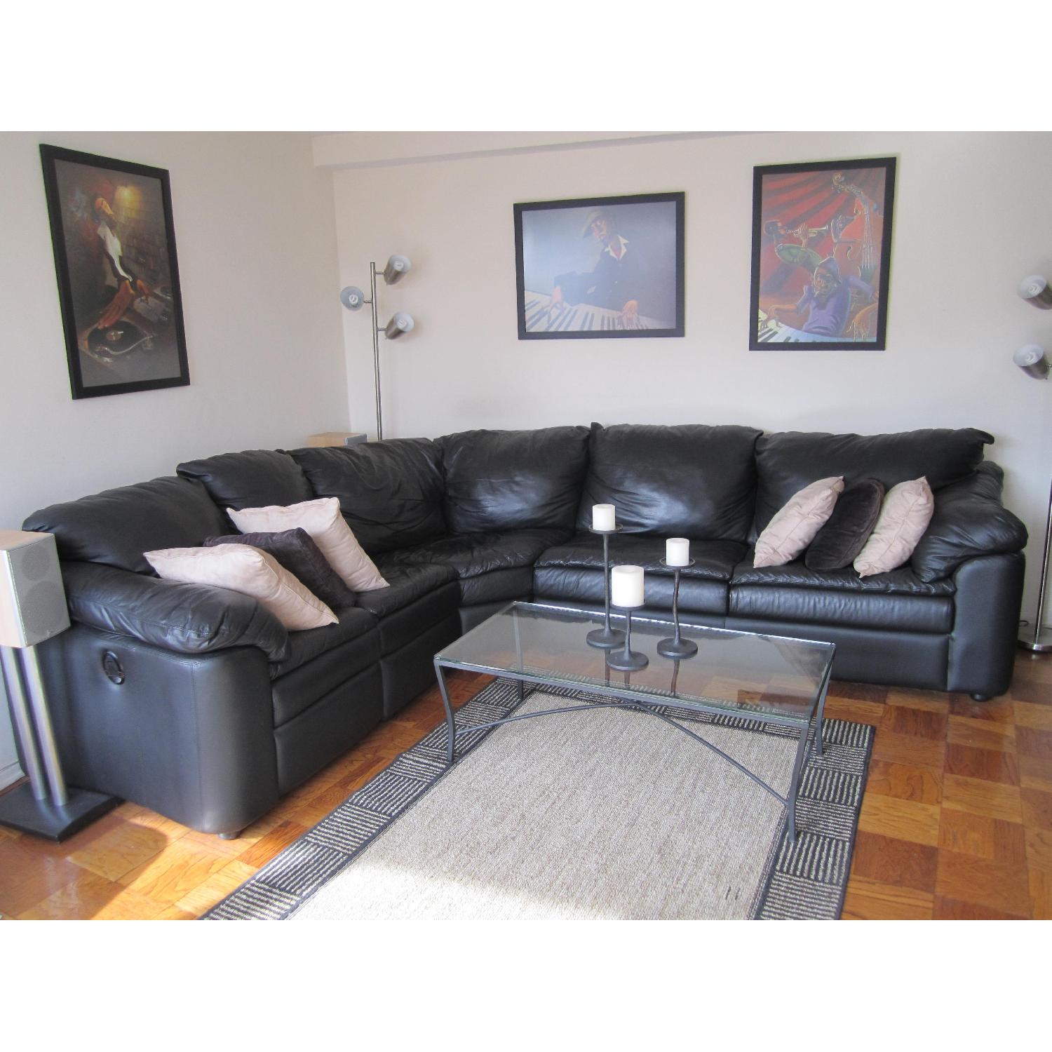 Jennifer Convertible Black Leather Sectional Couch AptDeco