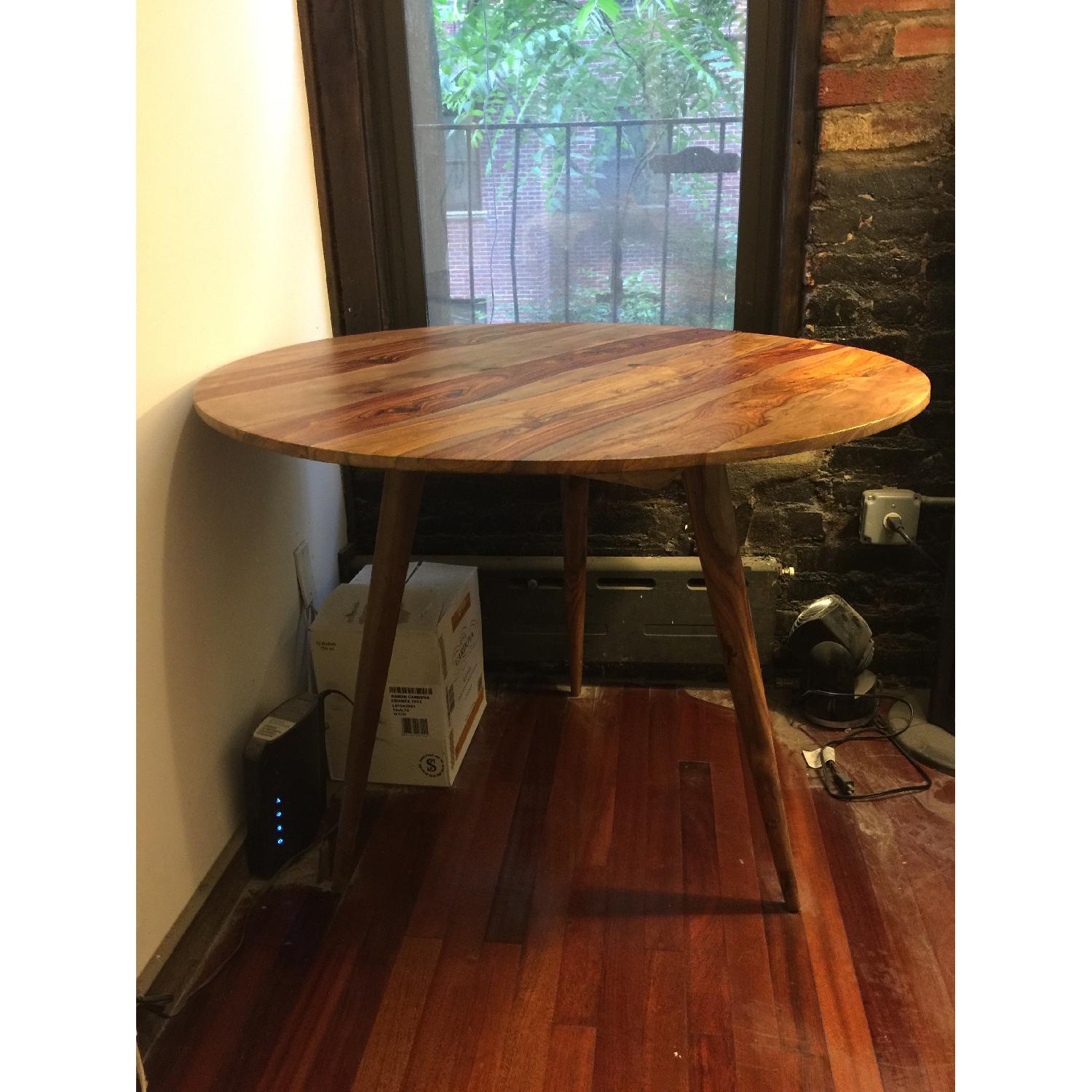 Urban Outfitters Round Dining Table - AptDeco