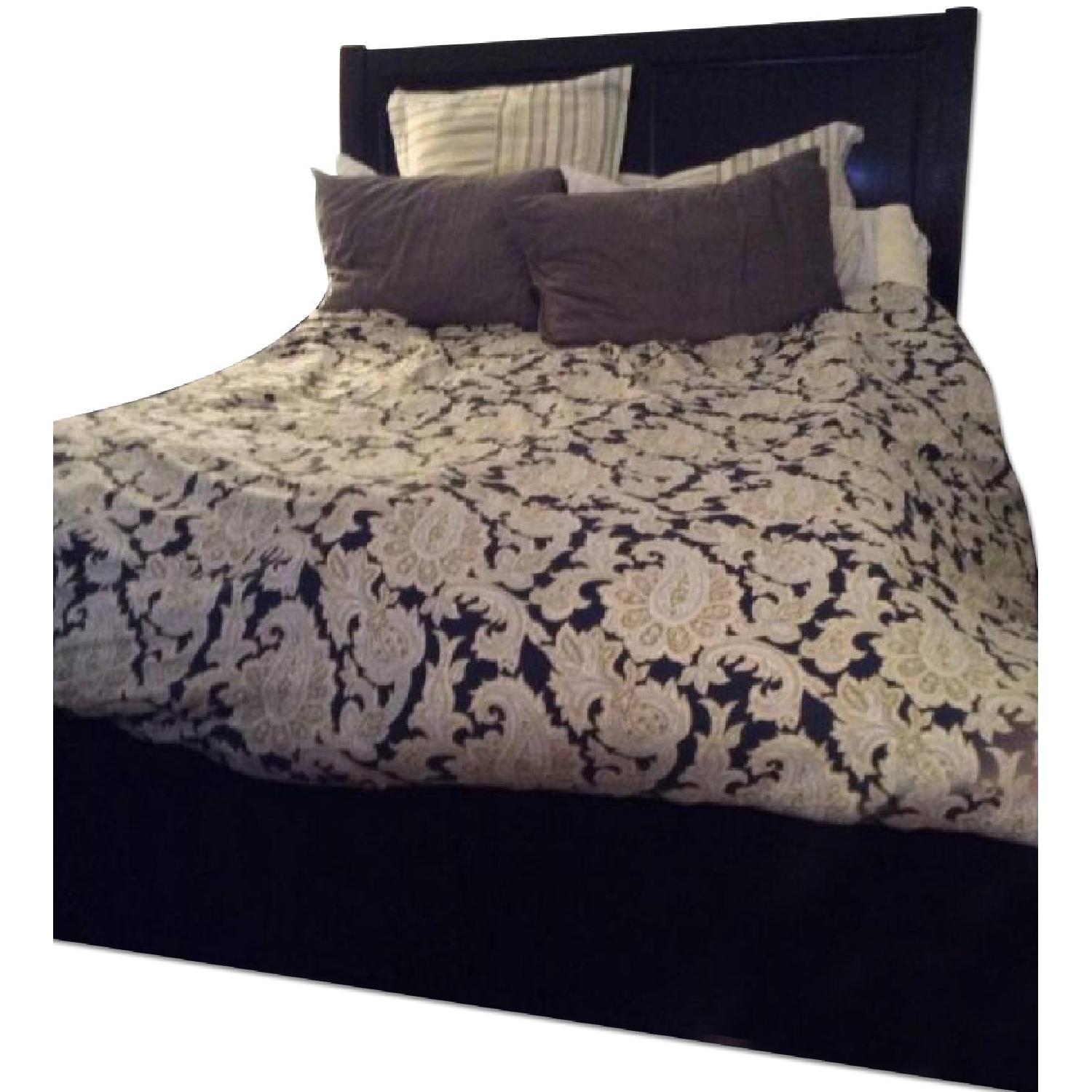 Ashley's Queen Sleigh Bed Frame - image-0