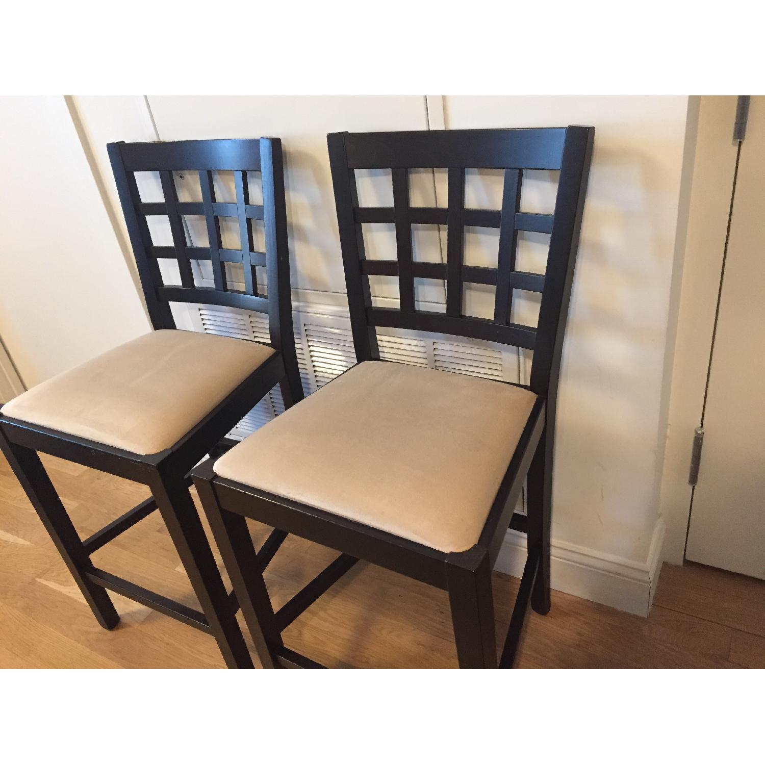 2 Dark Brown Wooden Bar stools AptDeco