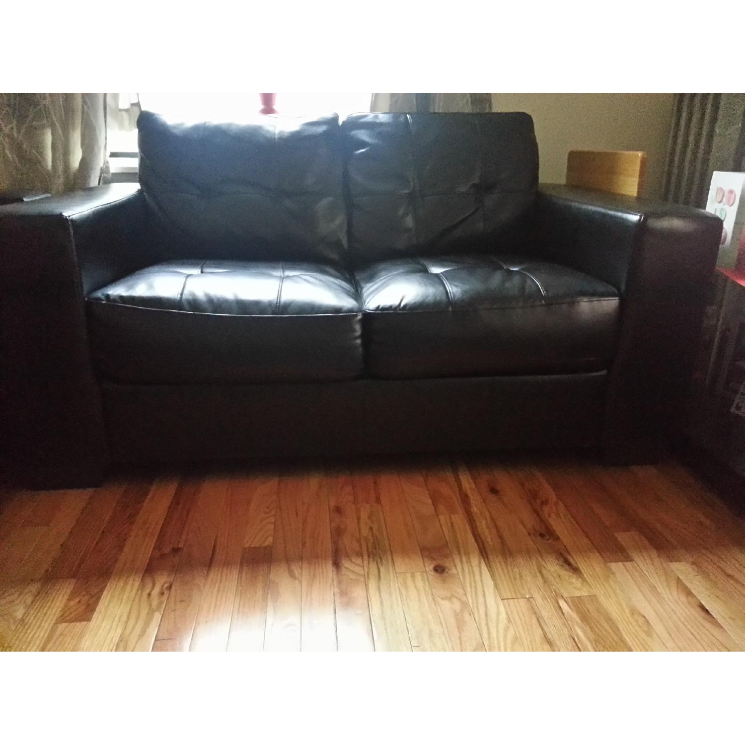 Value City Black Leather Sofa + Loveseat - image-1