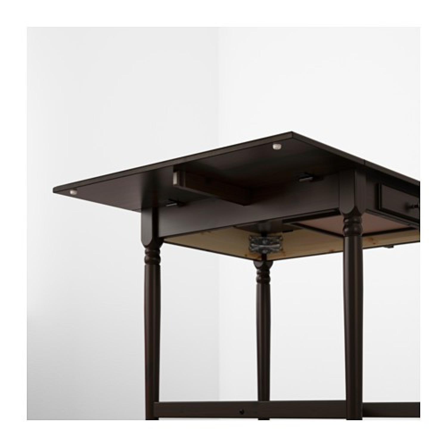 Ikea Ingatorp Drop-Leaf Table w/ 2 Folding Black Chairs - AptDeco
