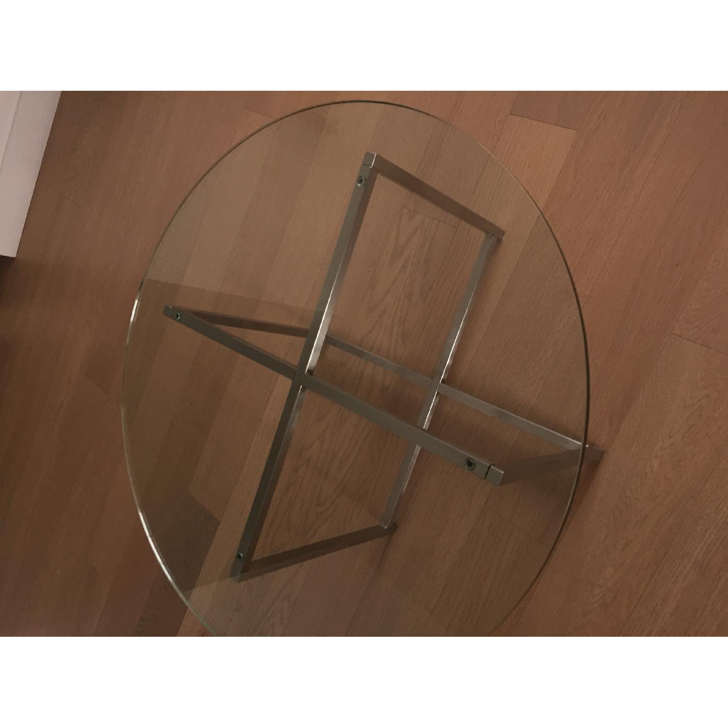 Room & Board Round Glass Cocktail Table w/ Stainless Steel Legs - image-1