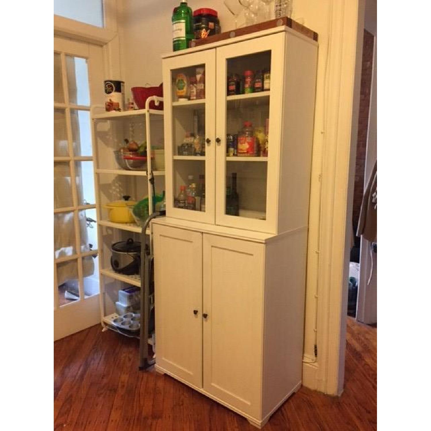 Ikea Borgsjo Cabinet w/ Glass Doors - image-1