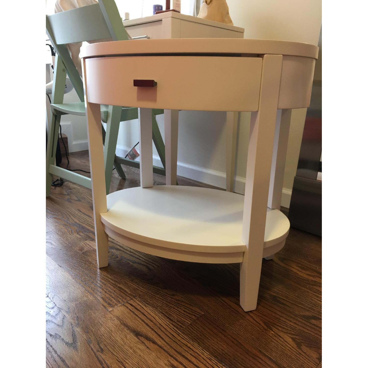 Crate & Barrel Arch White Oval Nightstand AptDeco