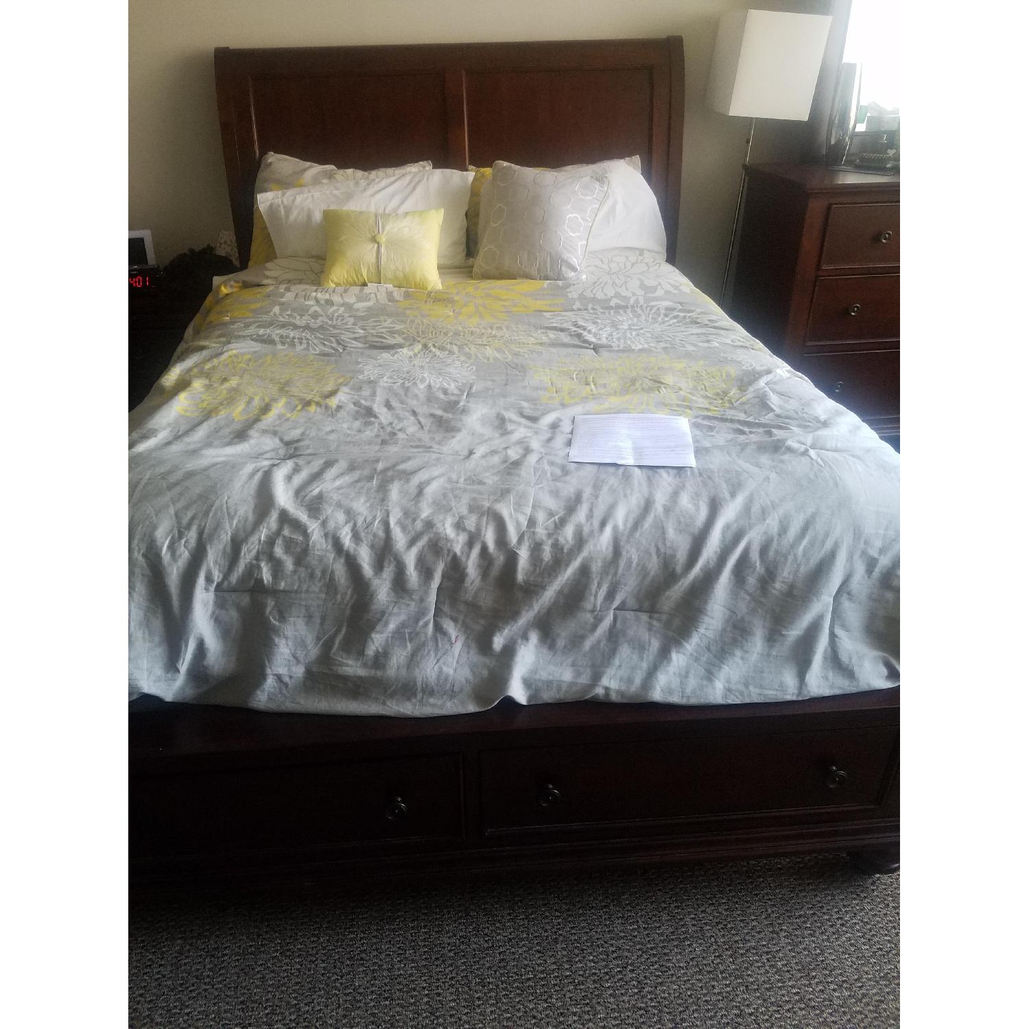 Raymour & Flanigan Queens Size Cherry Wood Bed Frame AptDeco