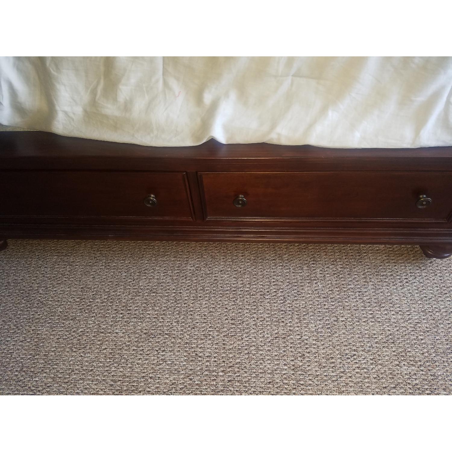 Raymour & Flanigan Queens Size Cherry Wood Bed Frame AptDeco