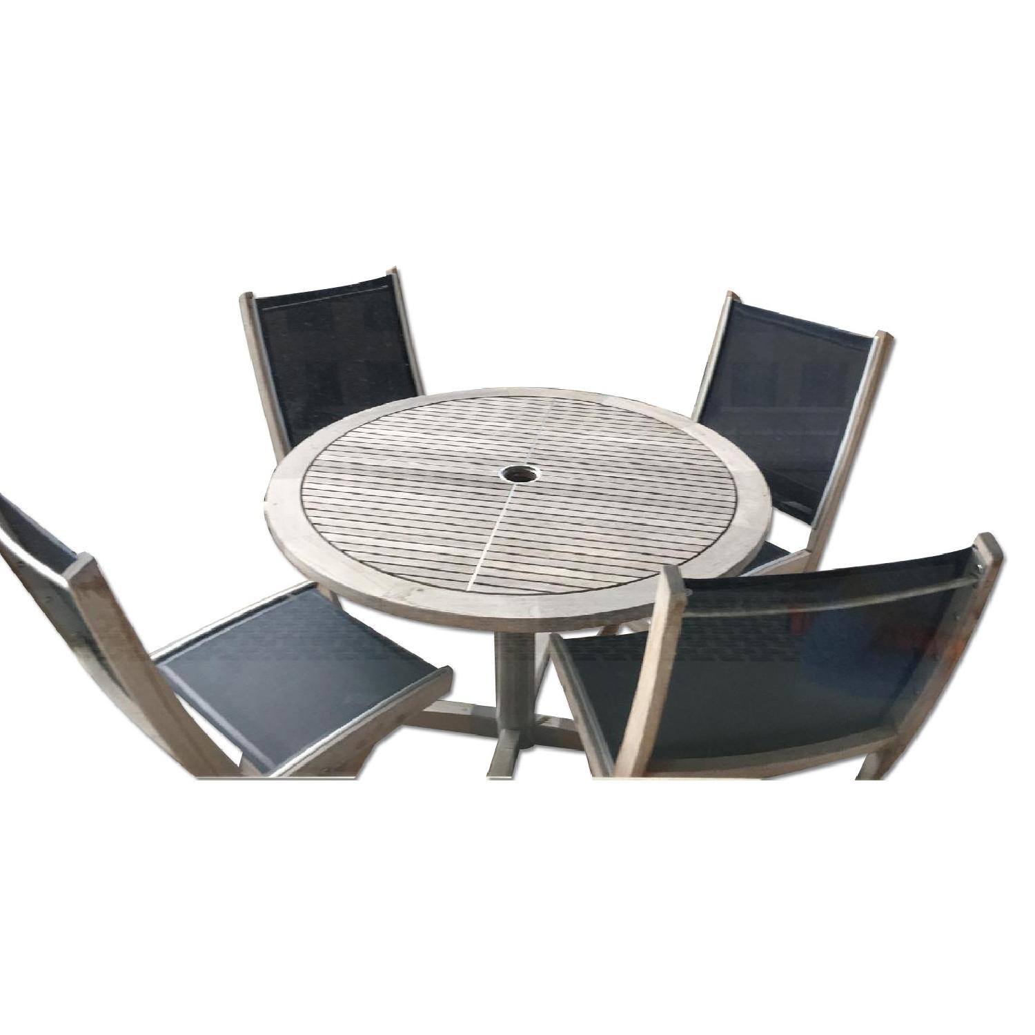 Gloster Patio Table w/ 4 Solana Folding Chairs AptDeco