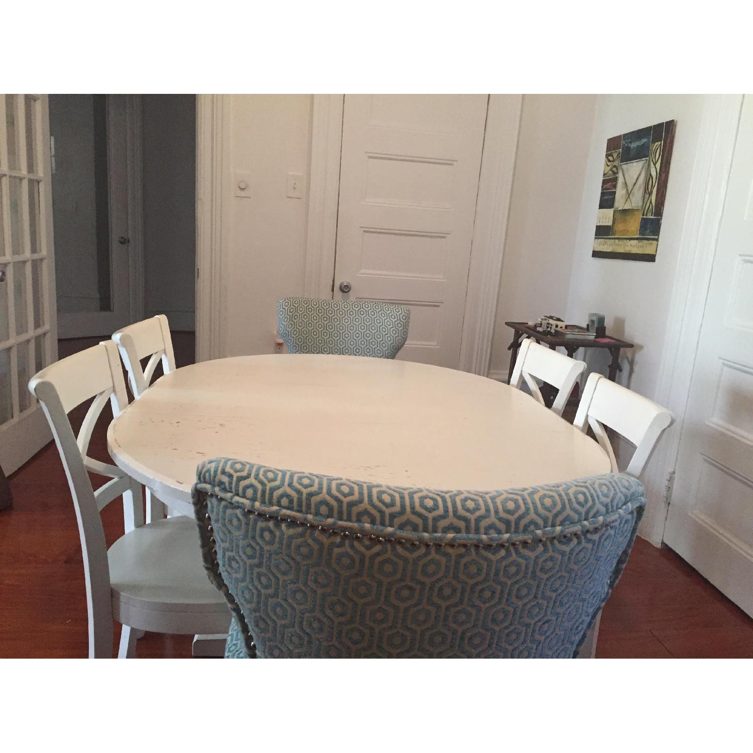 Crate & Barrel Distressed White Pedestal Dining Table with Extension - image-3