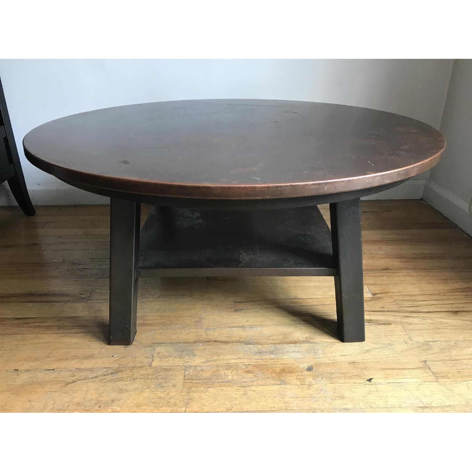Crate & Barrel Copper Top Round Coffee Table AptDeco