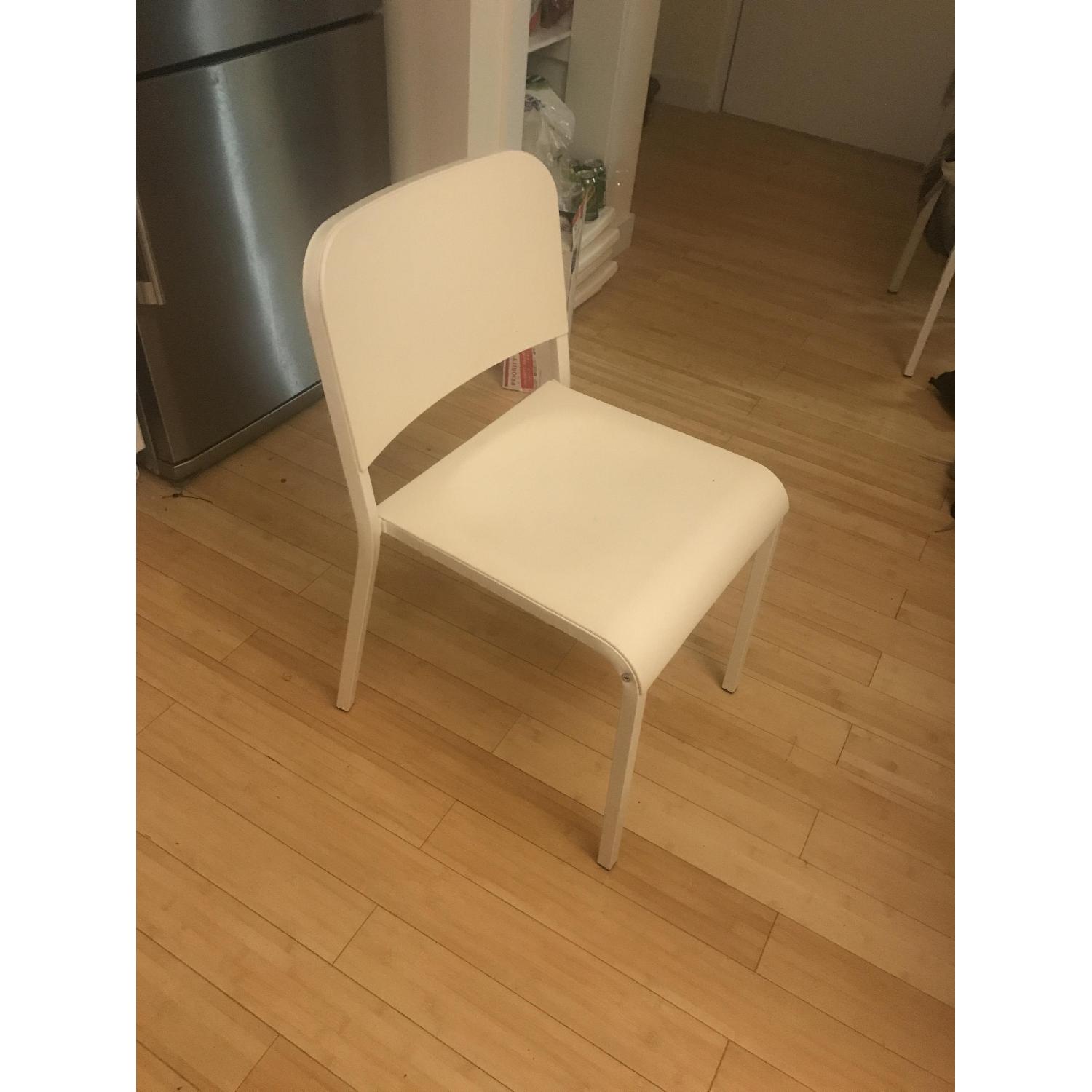 Ikea Stackable White Chairs - image-1