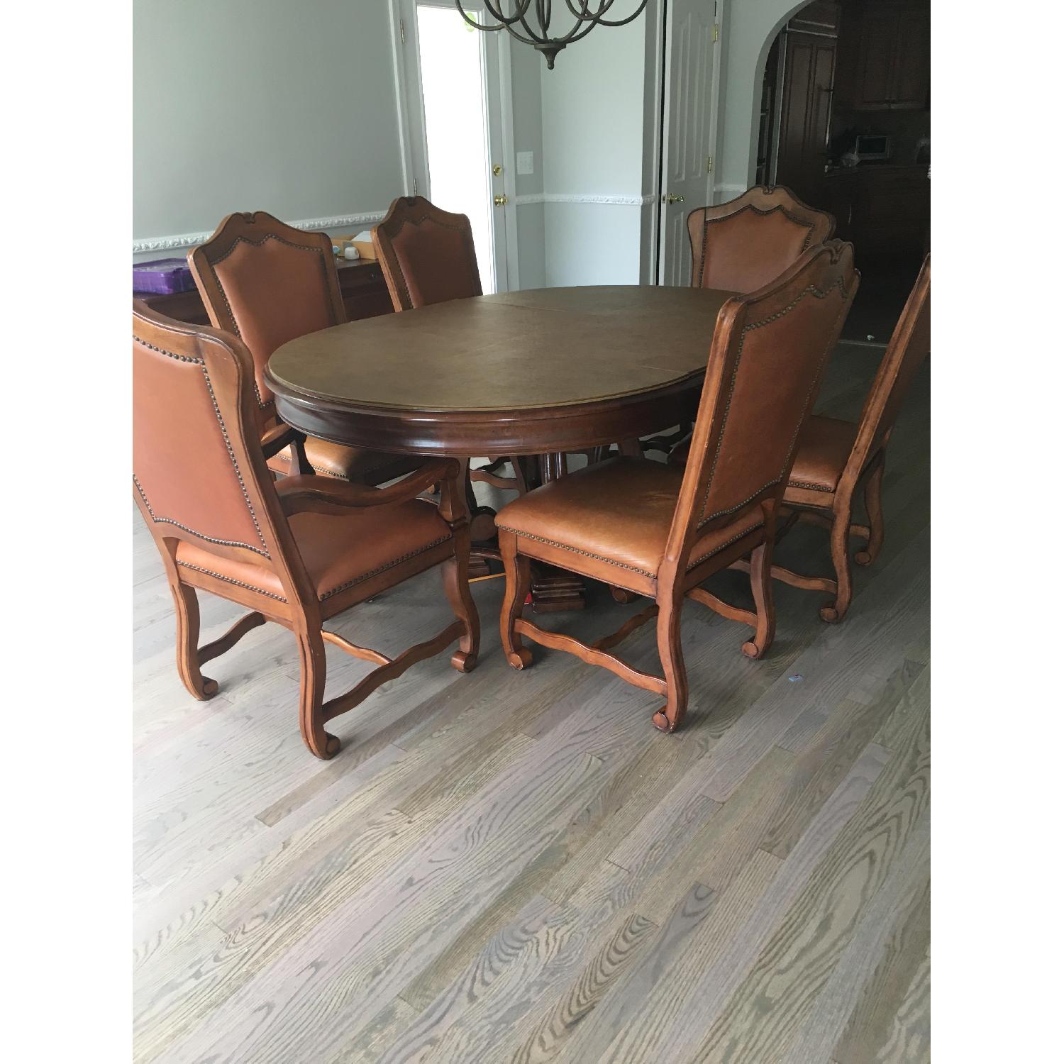 Stanley Furniture Oval Dining Table w/ 6 Leather Chairs AptDeco