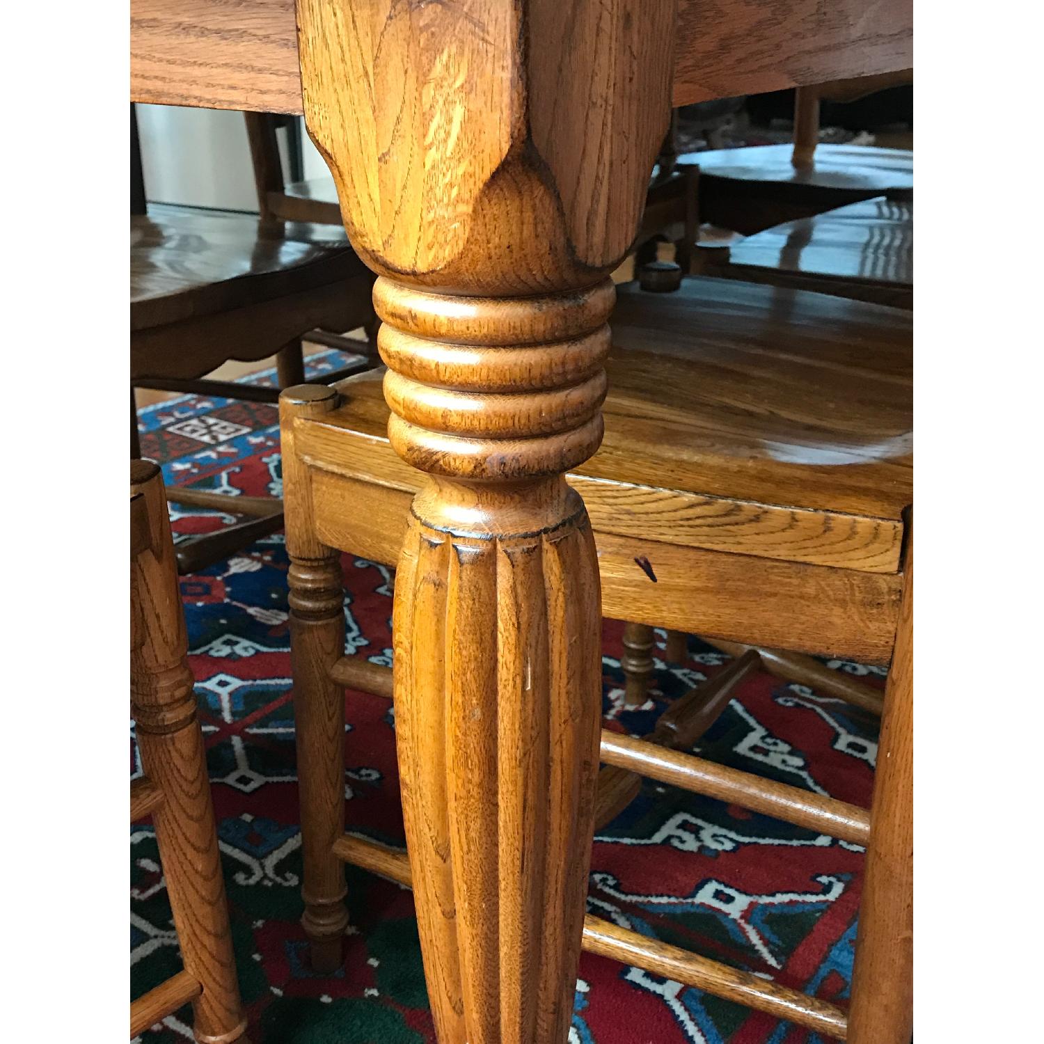 Solid Oak Dining Table w/ 6 Solid Oak Dining Chairs - AptDeco
