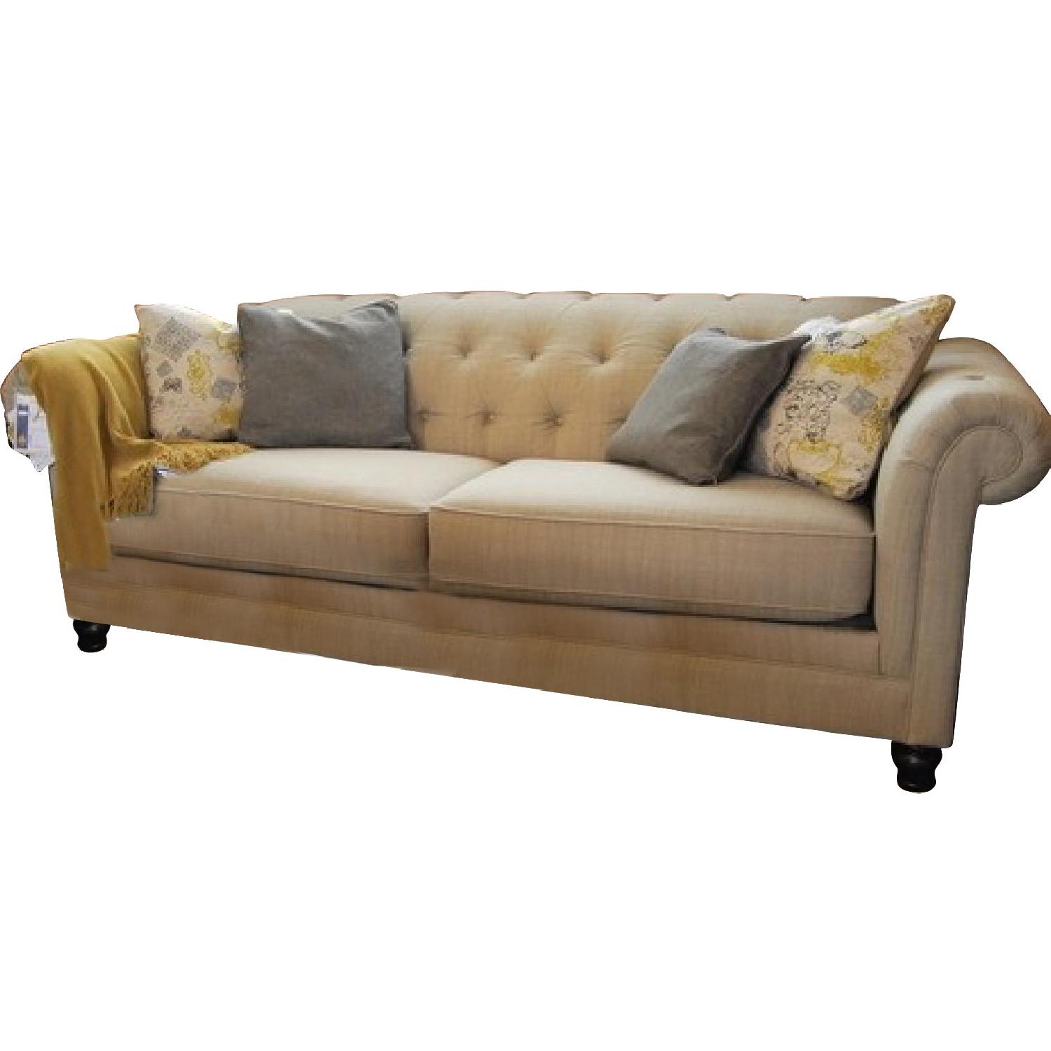 Ashley's Hindell Park Putty Sofa w/ Ottoman + Accent Chair AptDeco