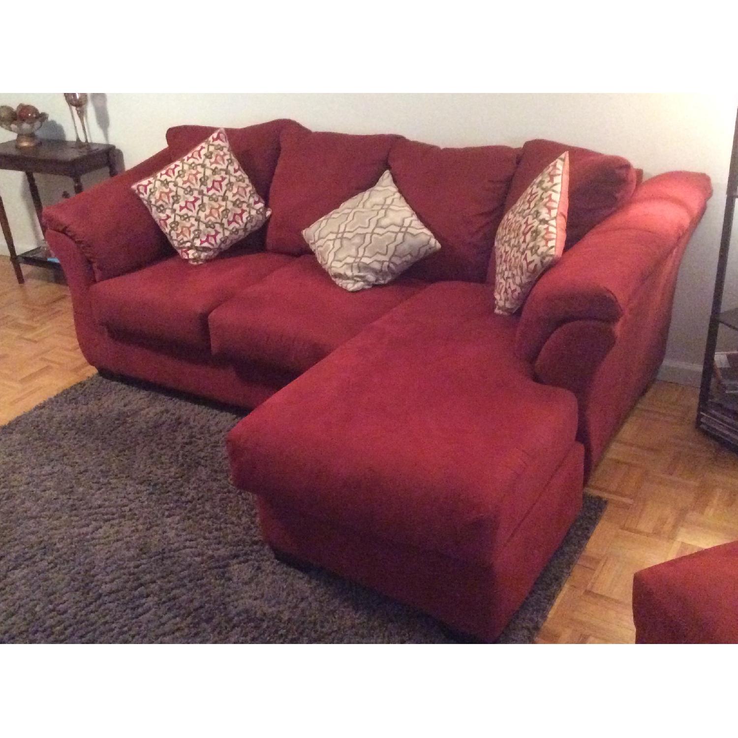 Ashley's Red Microfiber Sectional Sofa + Chair & Ottoman - image-2