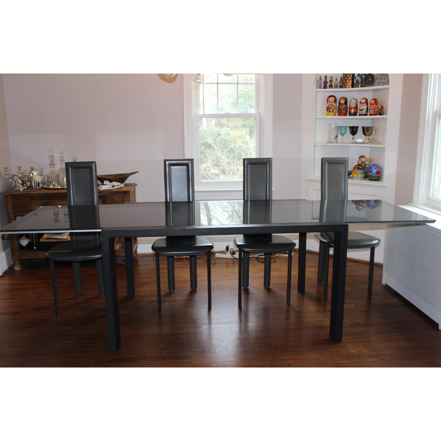 Ligne Roset Glass Dining Table w/ 4 Leather Chairs AptDeco