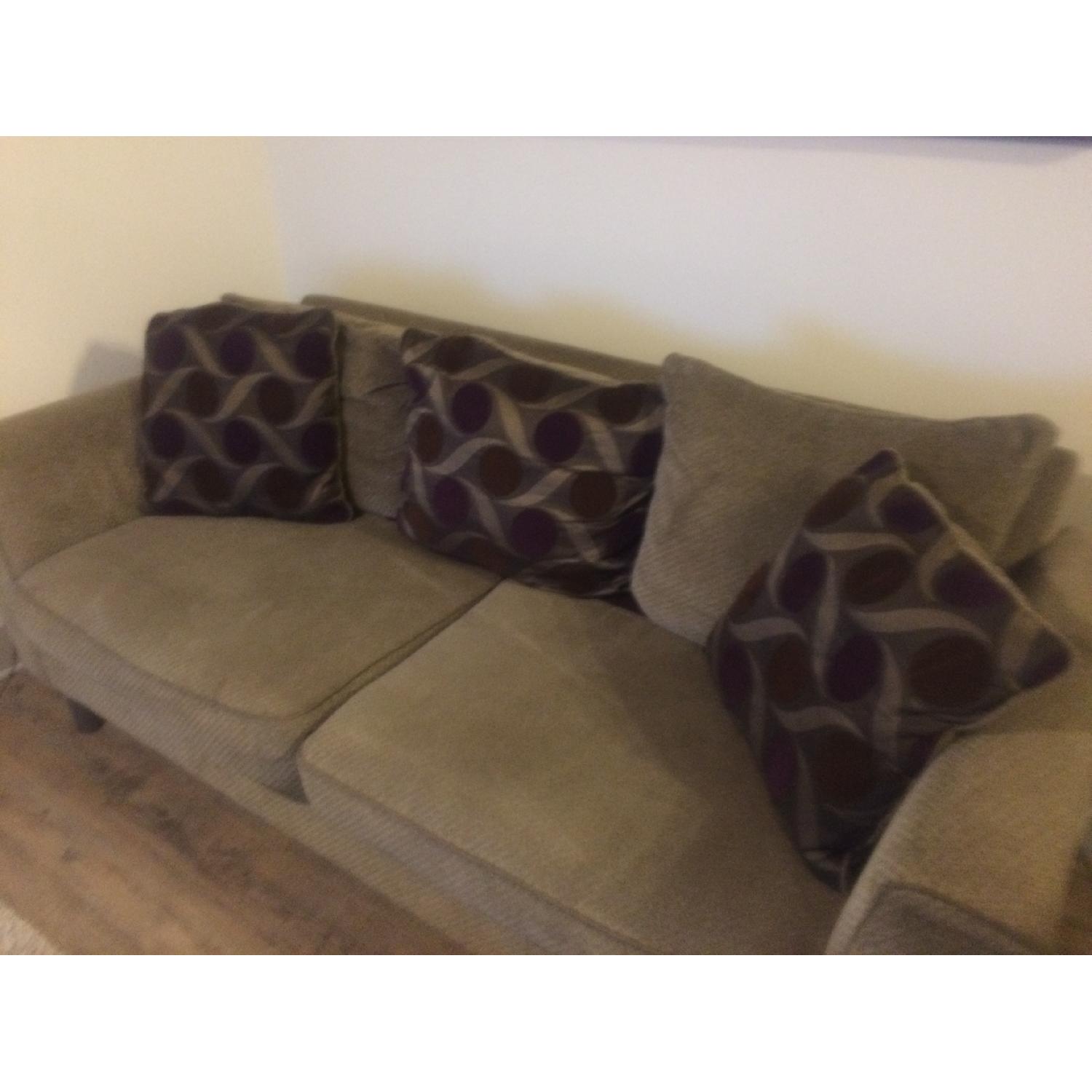 Ashley's Home Design Collection Sofa + Matching Arm Chair AptDeco