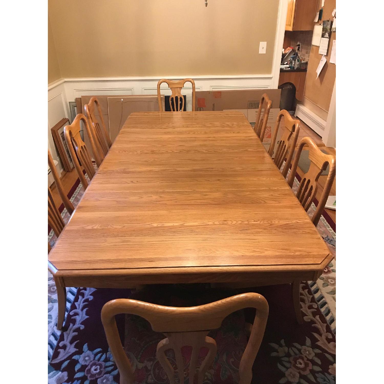 Keller Corporation Dining Table w/ 8 Chairs AptDeco