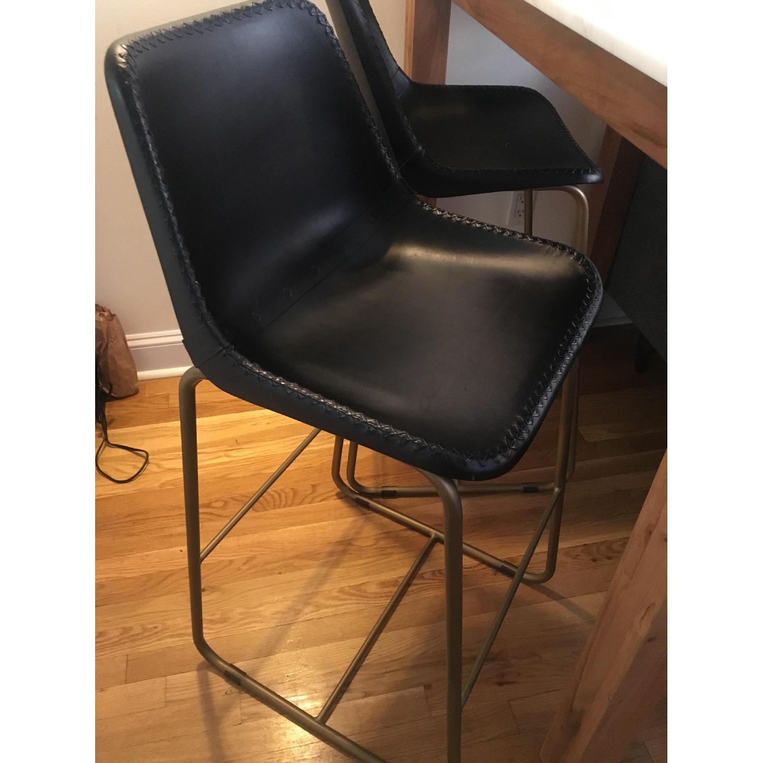 CB2 Roadhouse Black Leather Bar Stools AptDeco