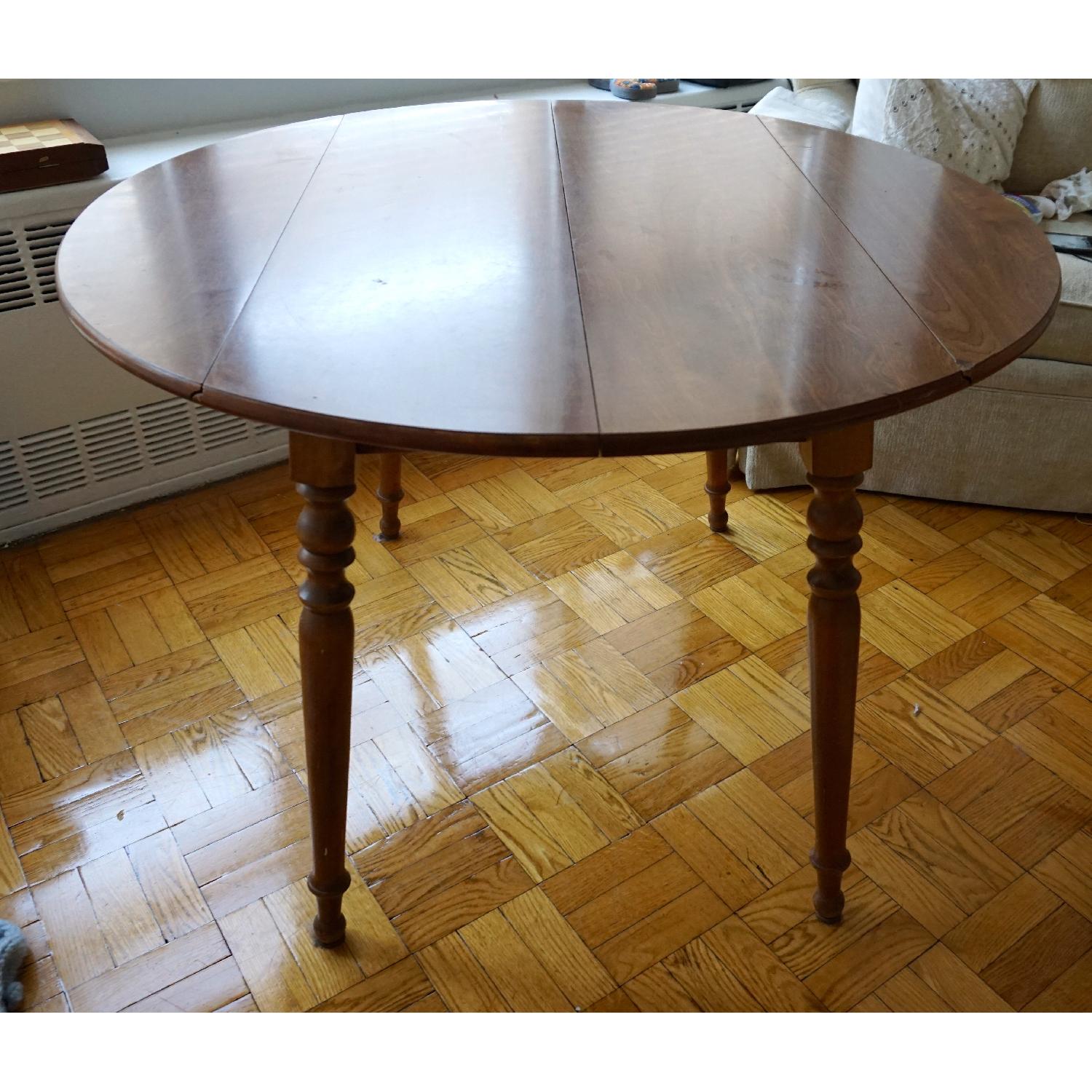Ethan Allen Drop Leaf Round Dining Table w/ Laminate Top - image-1