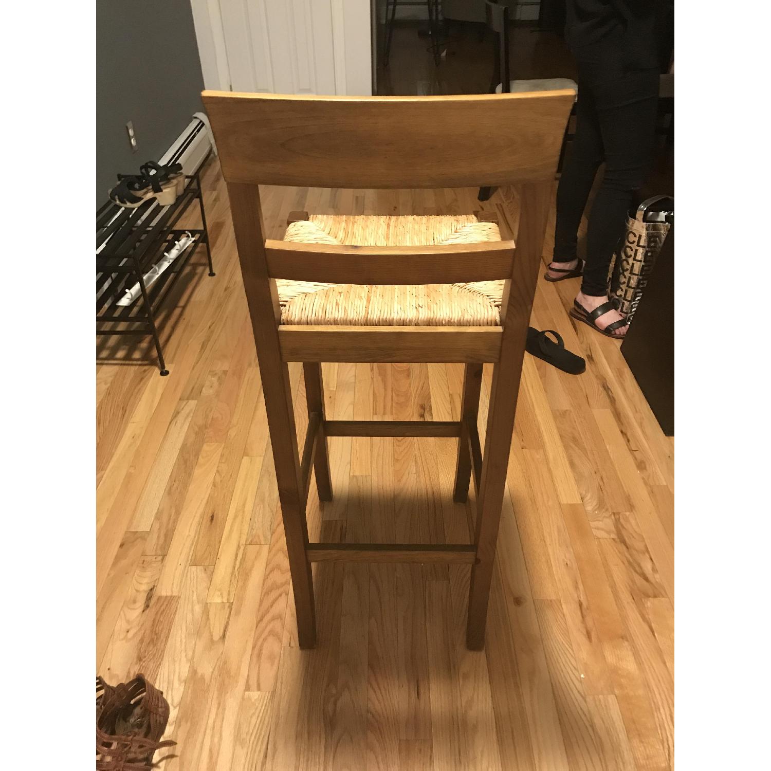 Pier 1 Brown Wooden Bar Stool w/ Woven Seat - image-4