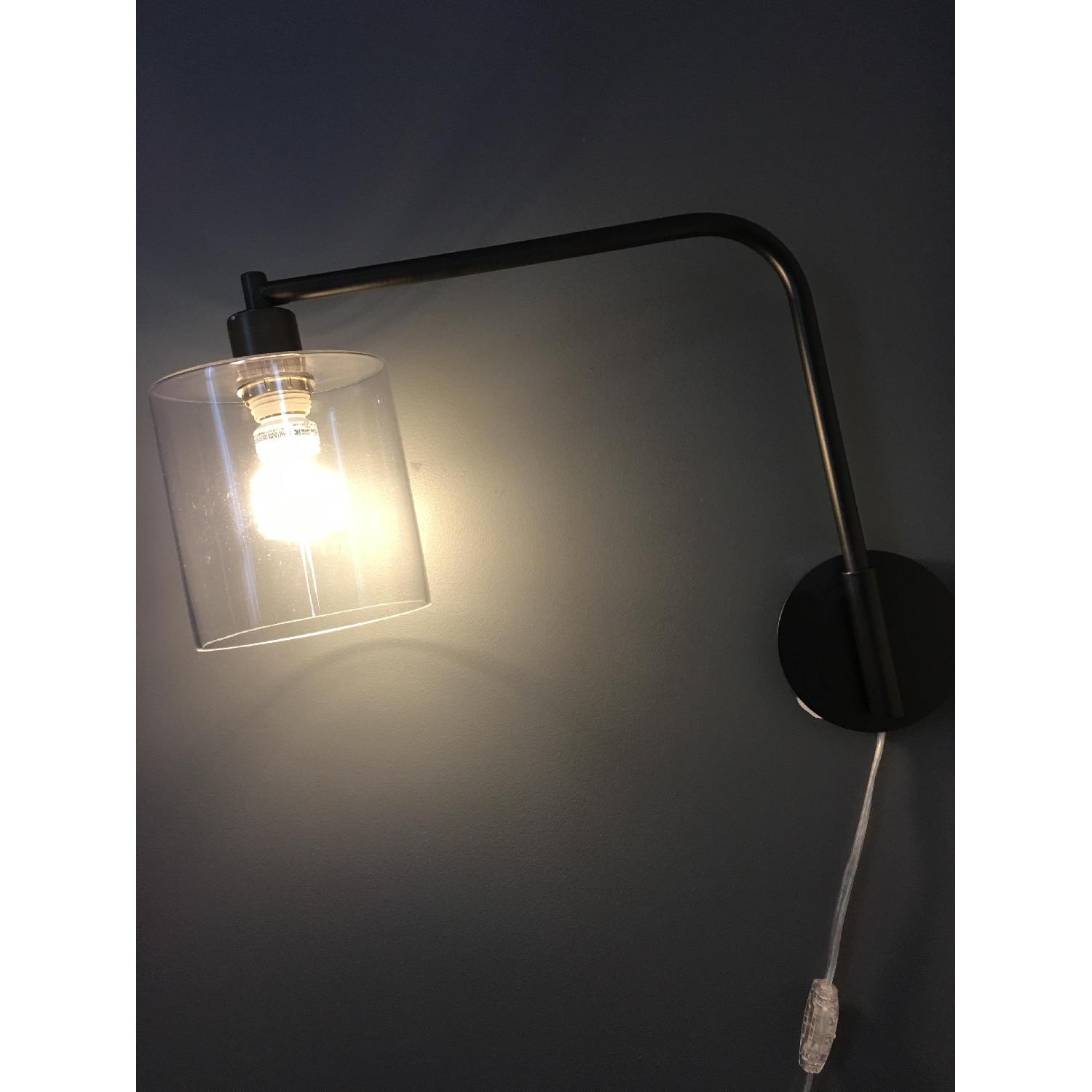 West Elm Antique Bronze Lens Plug In Sconces - image-1