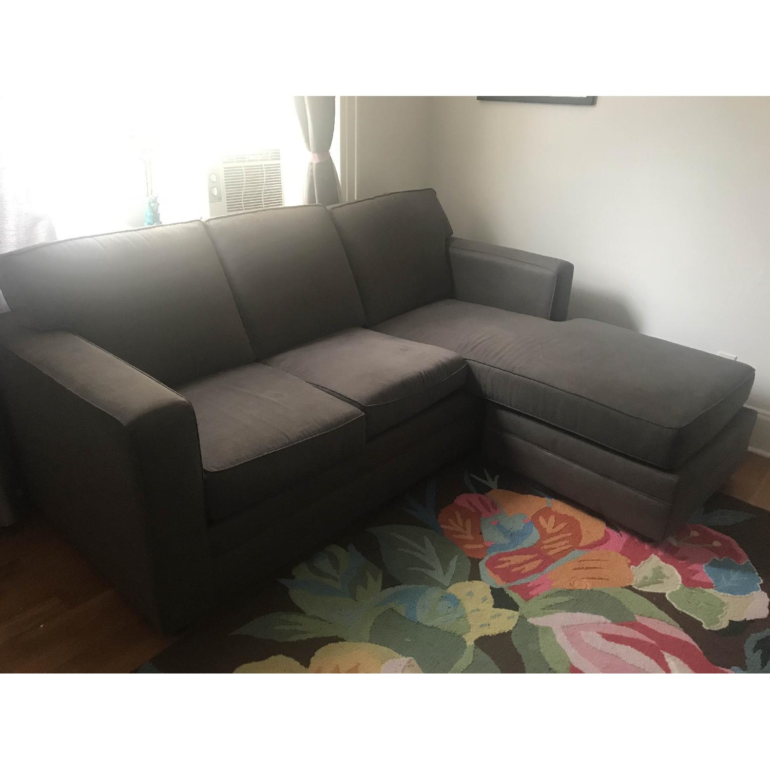 Jennifer Convertibles Gray Sectional Sofa - image-1