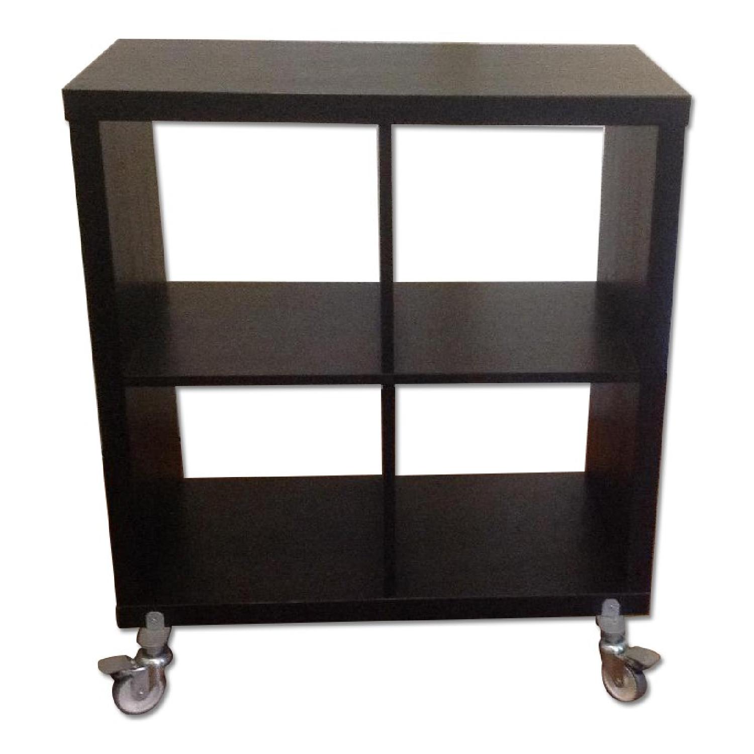 Ikea Dark Wood Bookcase w/ Wheels AptDeco