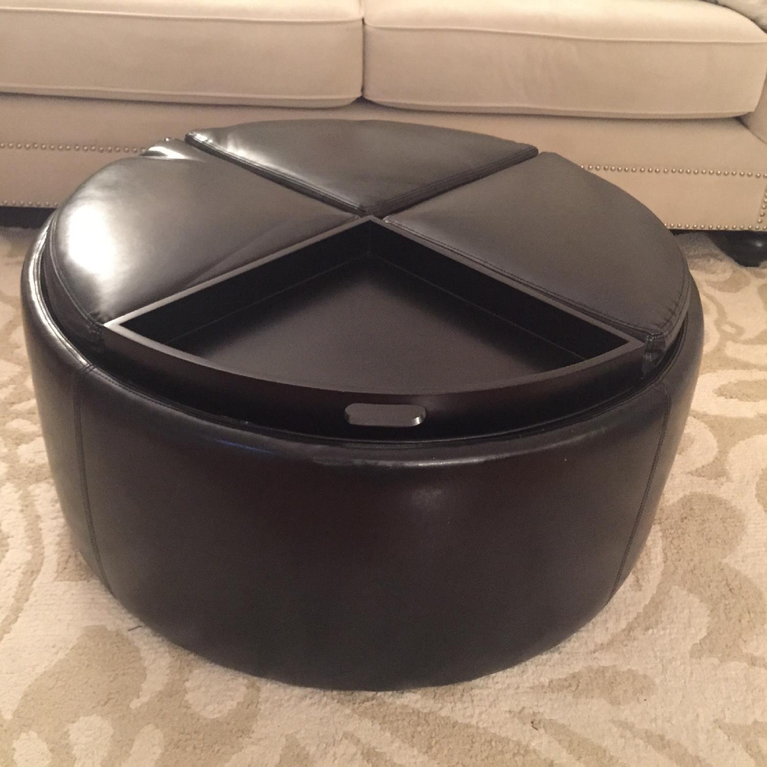 Raymour & Flanigan Black Leather Coffee Table/Ottoman AptDeco