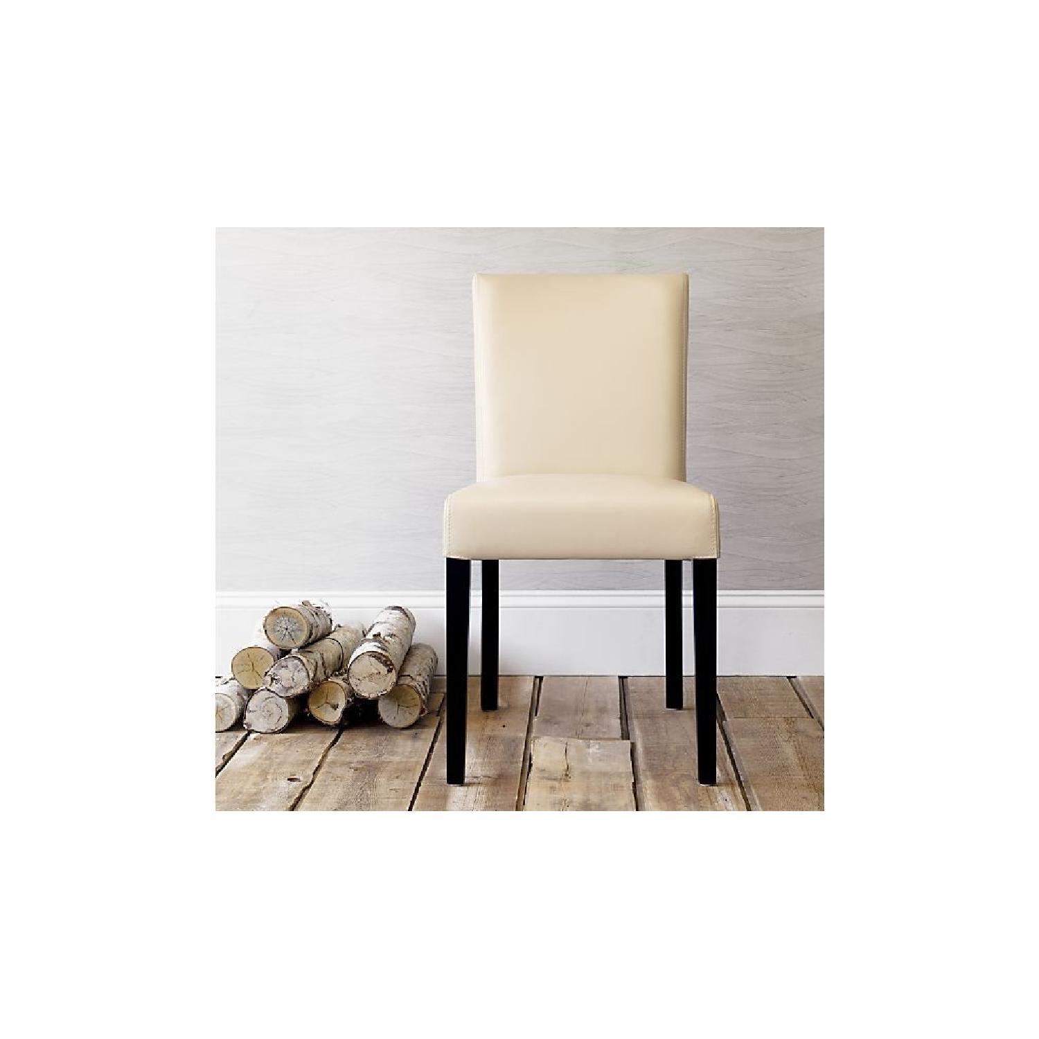 Crate & Barrel 2 Lowe Ivory Leather Dining Chairs - image-1