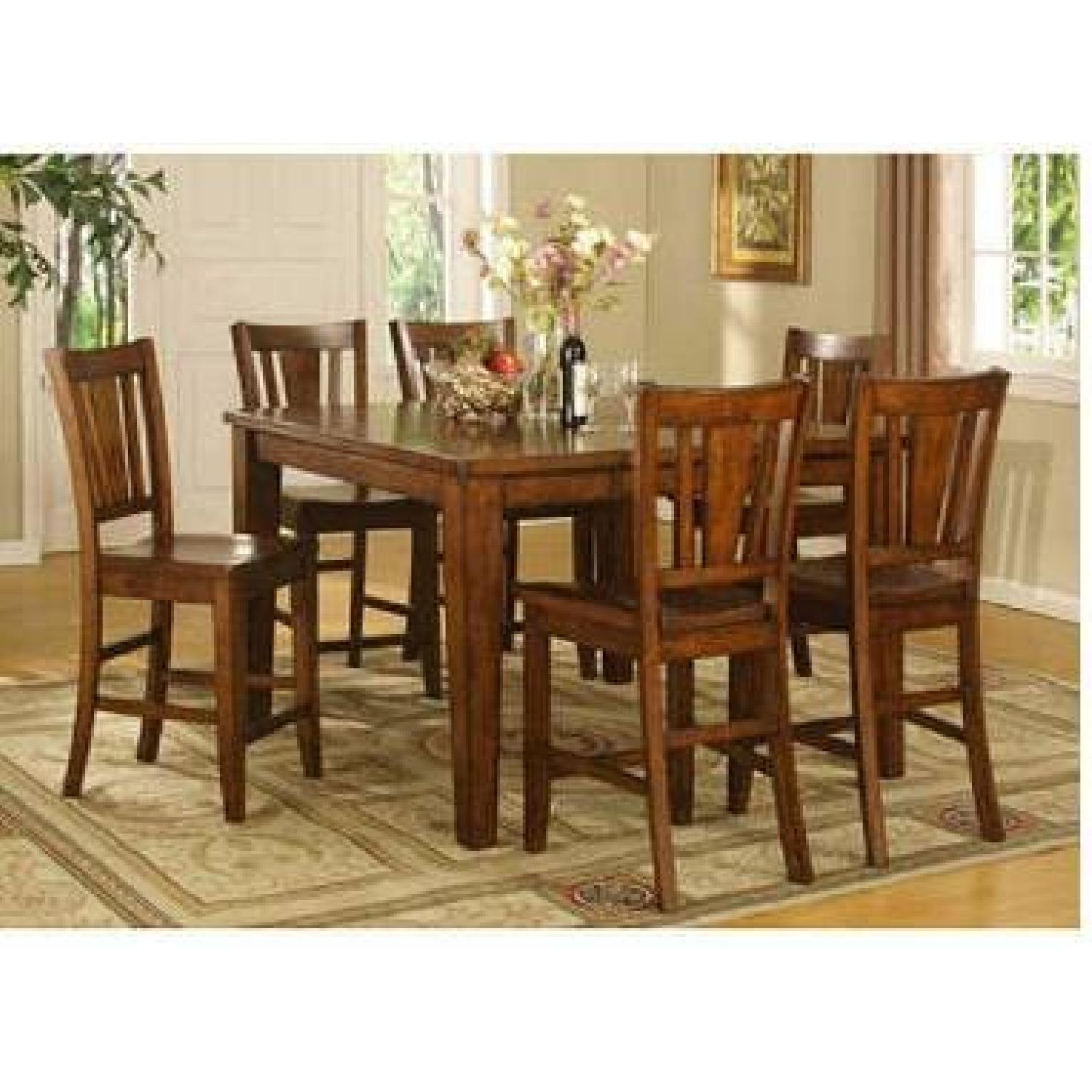Ashland Oak Dining Room Table w/ 6 Chairs AptDeco