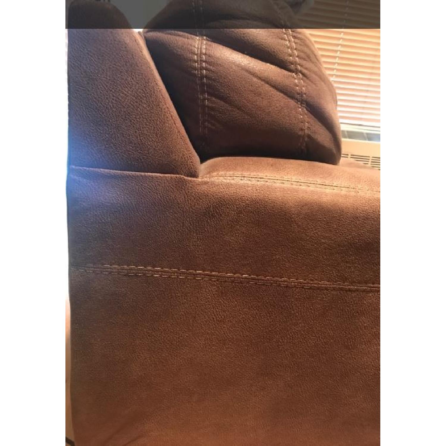 Ashley's Kylun Faux Leather Brown Couch - image-1