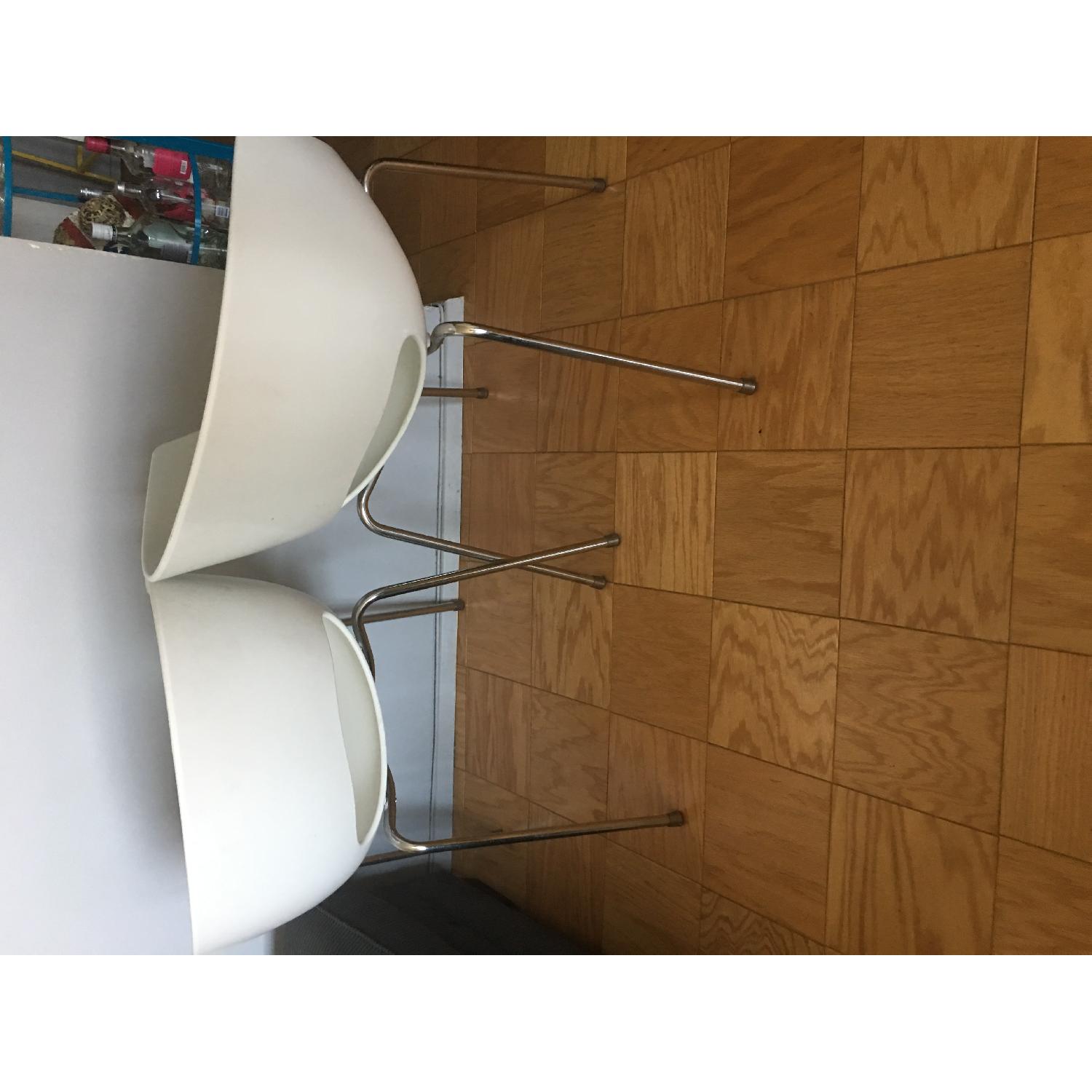 CB2 Orbit white Arm Chairs - image-5