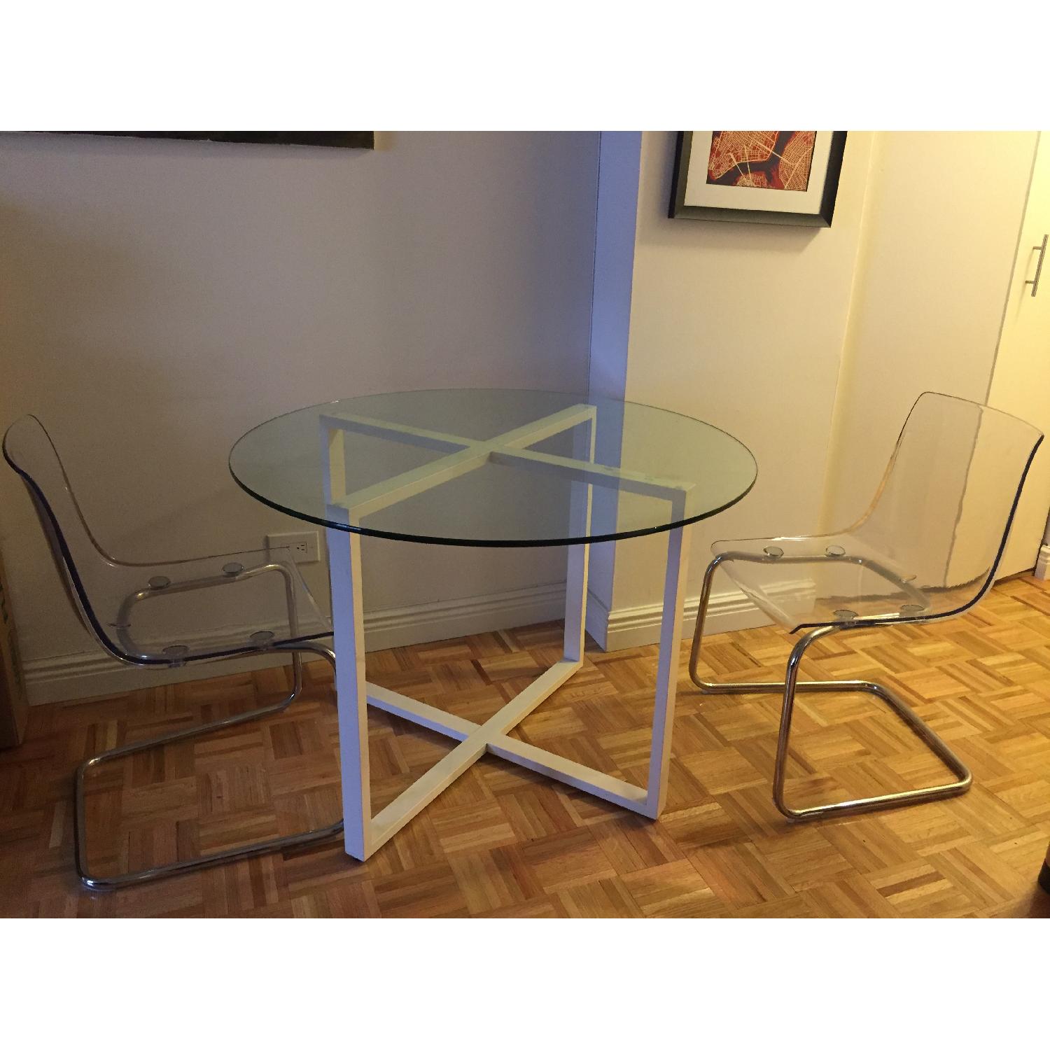 CB2 Round Glass Table w/ 2 Acrylic chairs - image-1