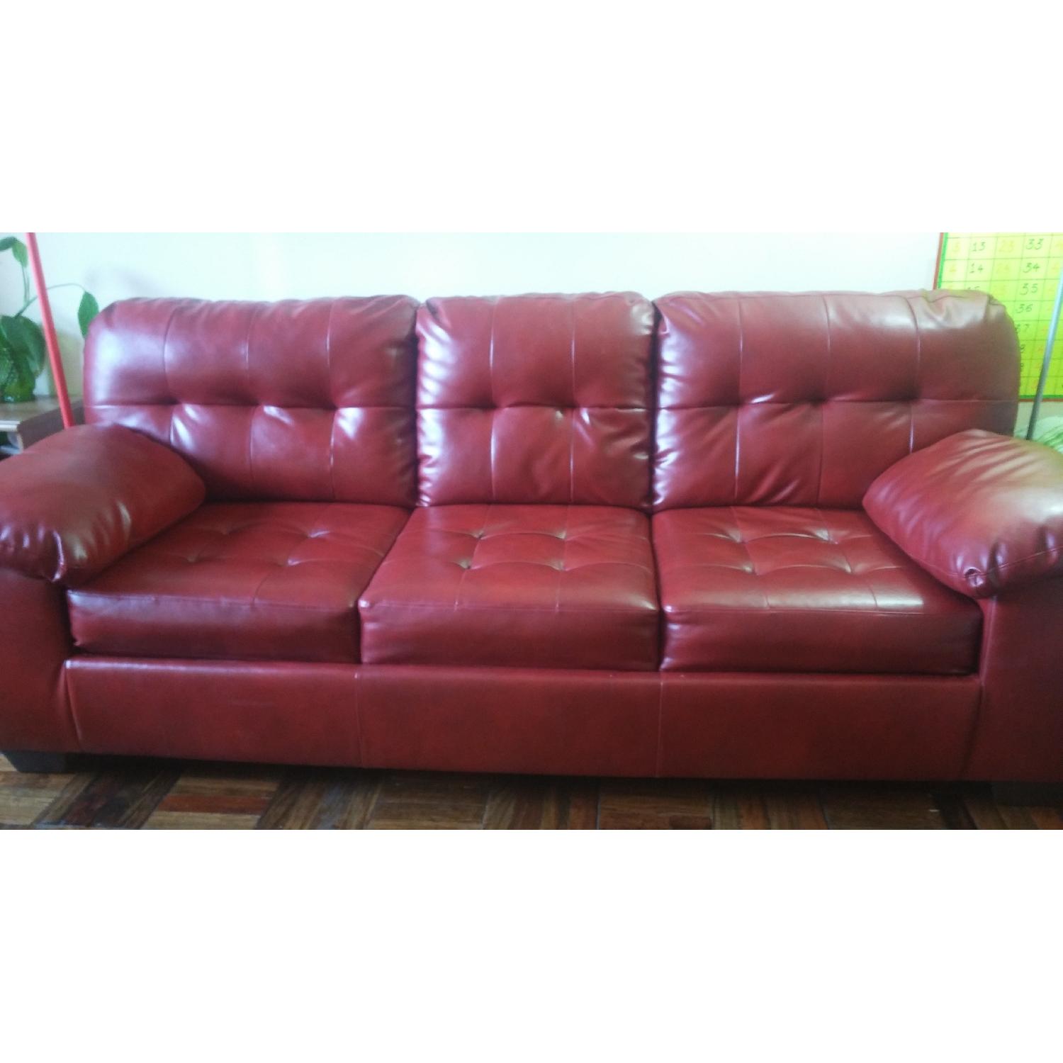 Ashley's Signature Design Alliston Sofa in Salsa DuraBlend - image-1