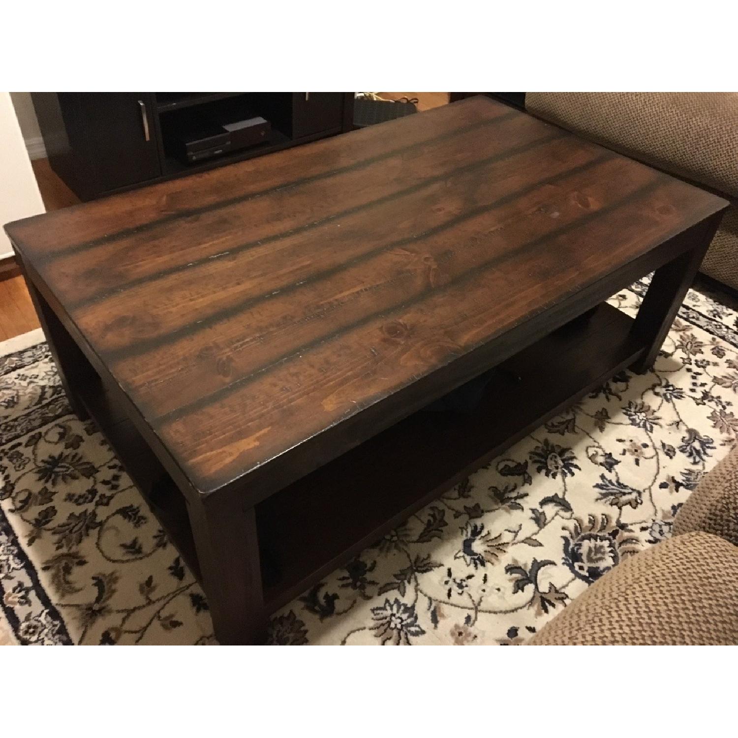 Ashley's Dark Wood Coffee Table - image-1
