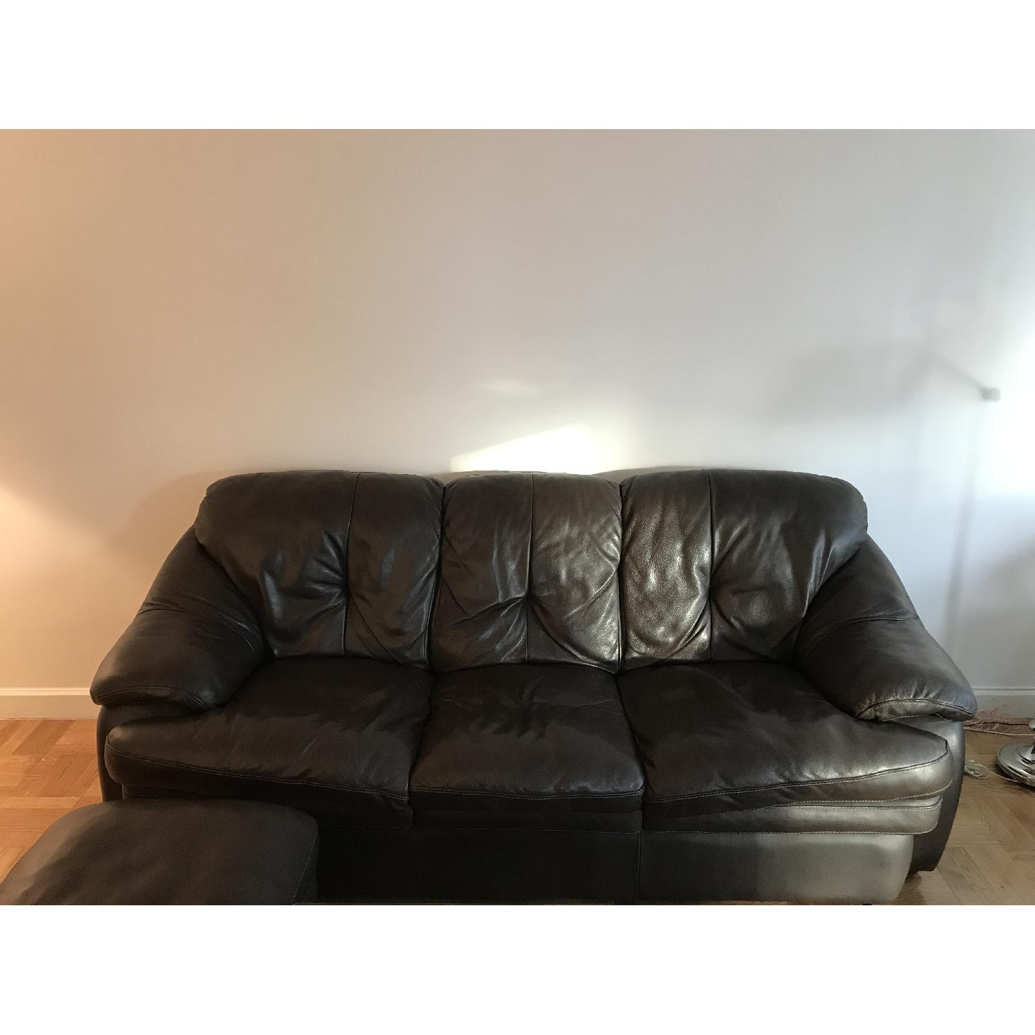 Bob's Brown Leather Sofa - image-1