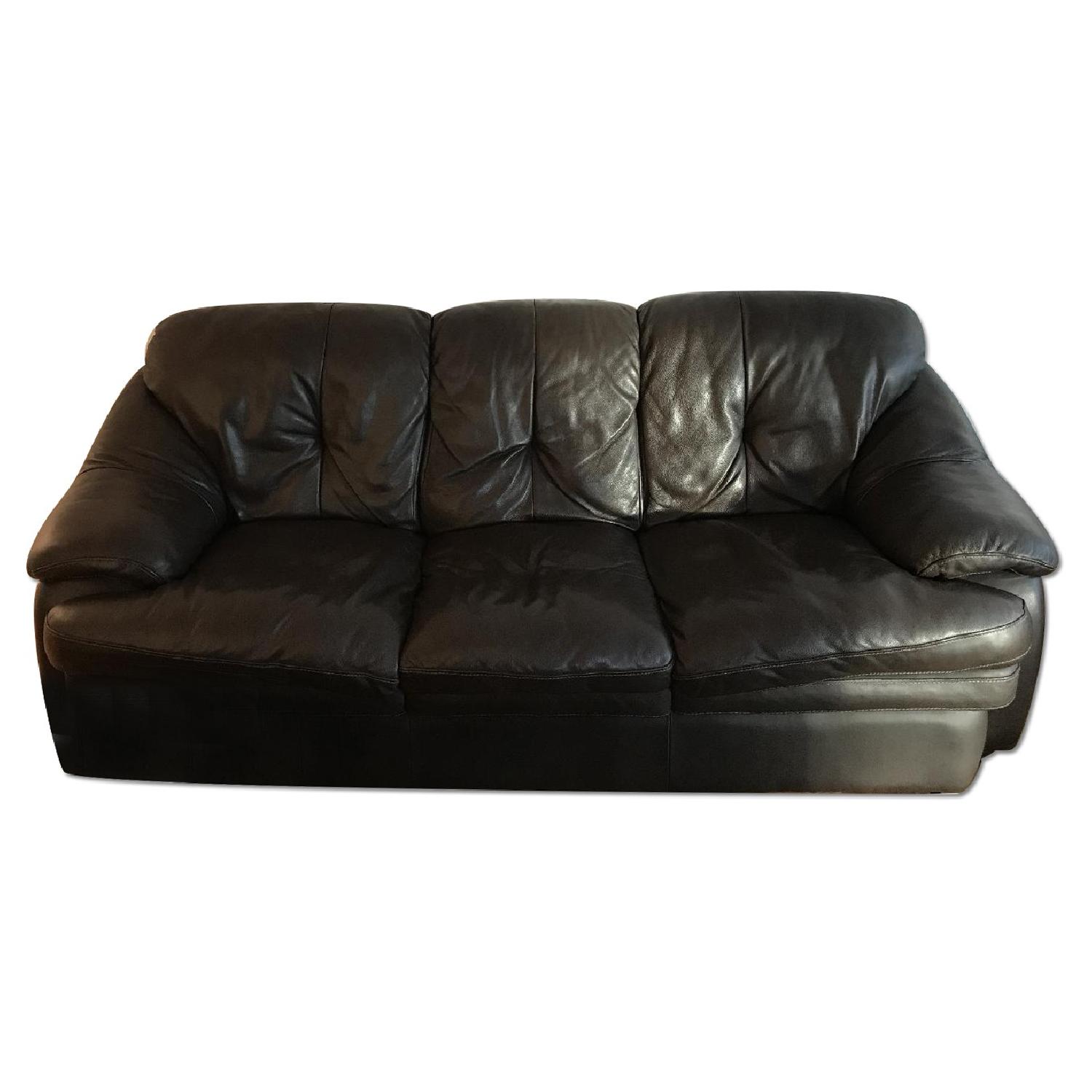 Bob's Brown Leather Sofa - image-0