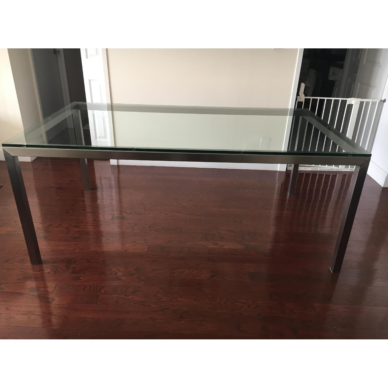 Crate & Barrel Parsons Clear Glass Top & Stainless Steel Base Dining Table - image-1