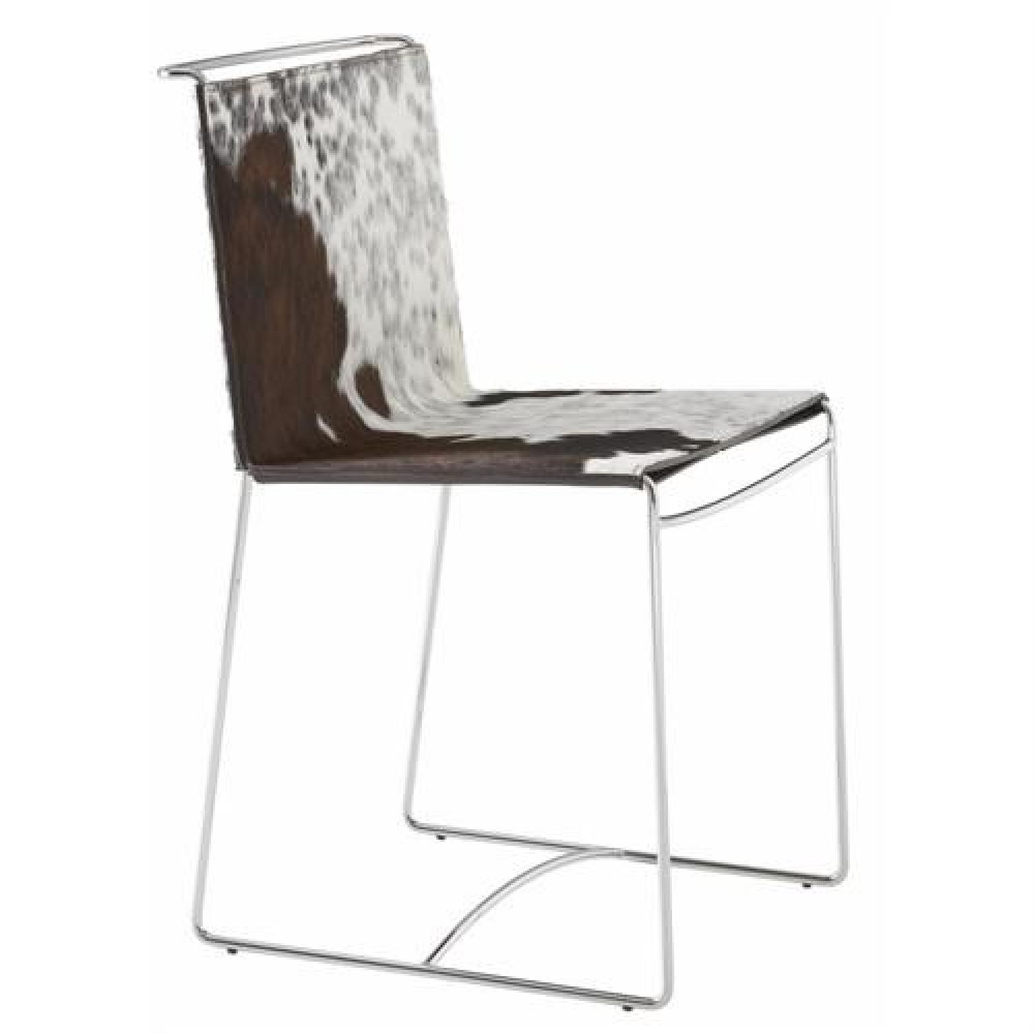 Ligne Roset Fil Cowhide Dining Chairs - AptDeco