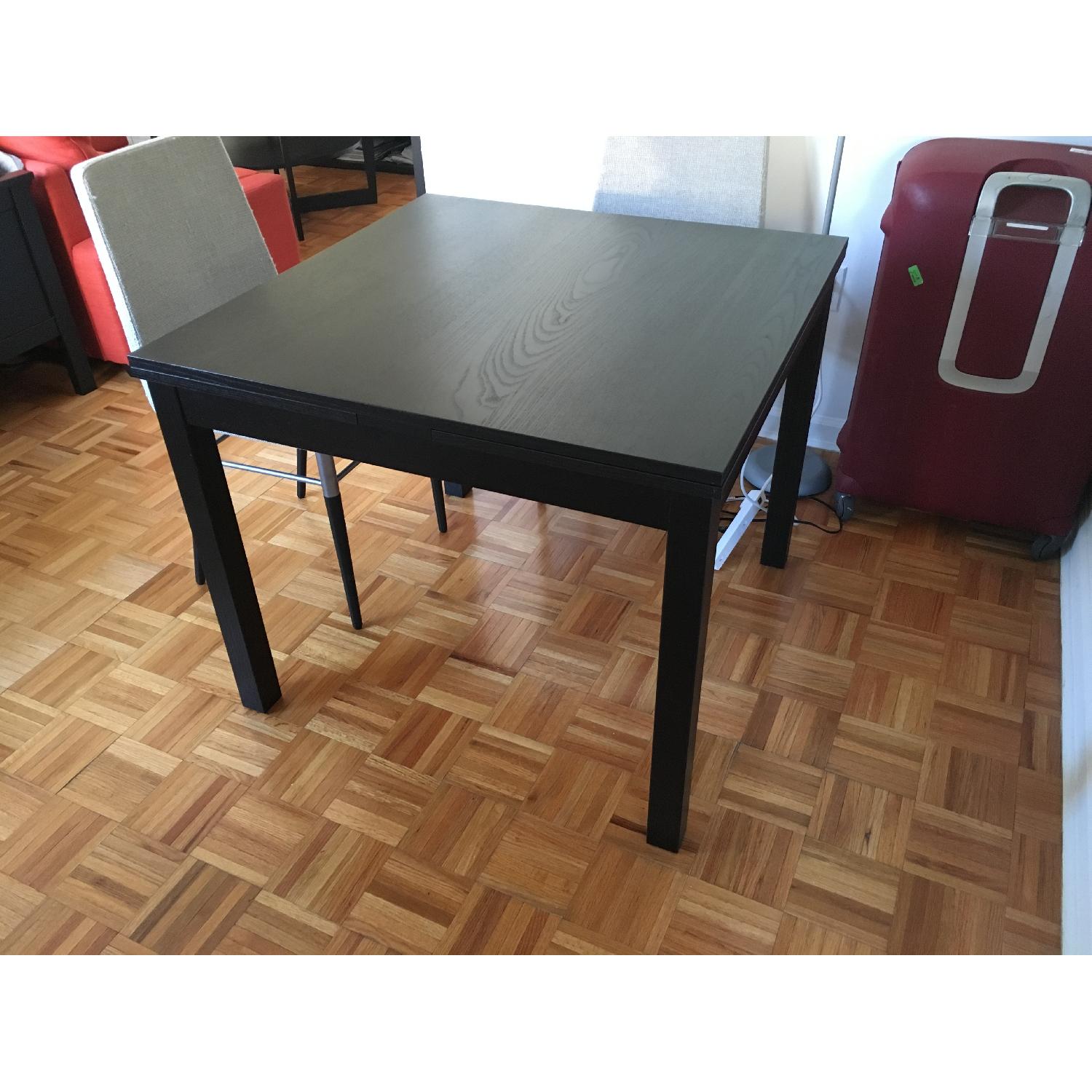 Ikea Bjursta Extendable Dining Table - AptDeco