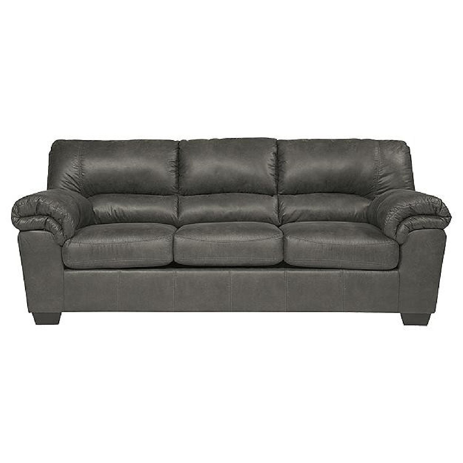 Ashley's Grey Suede Sofa + Loveseat - image-0