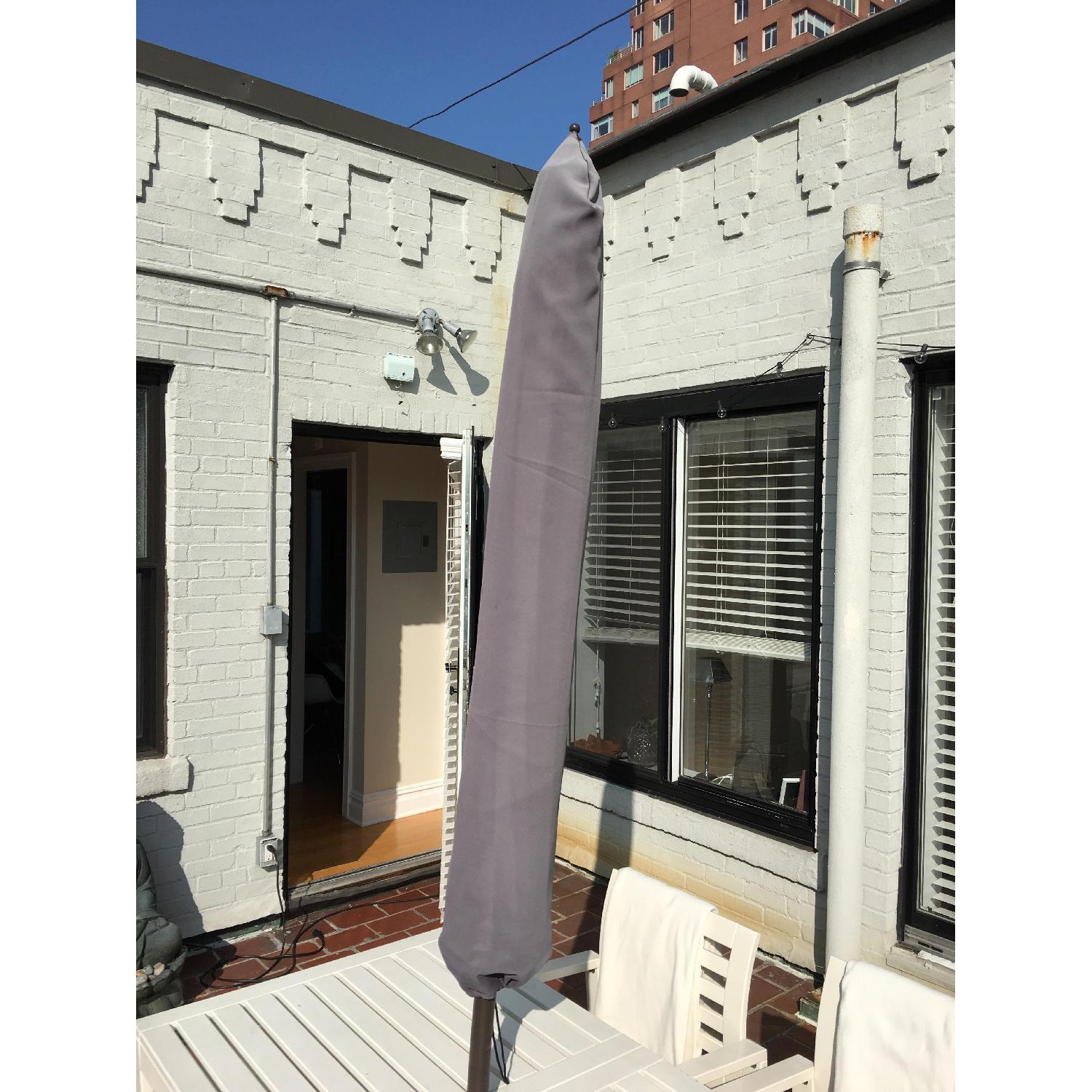 Ikea pplar Outdoor Dining Table w/ 4 Chairs + Black/White Umbrella - image-7