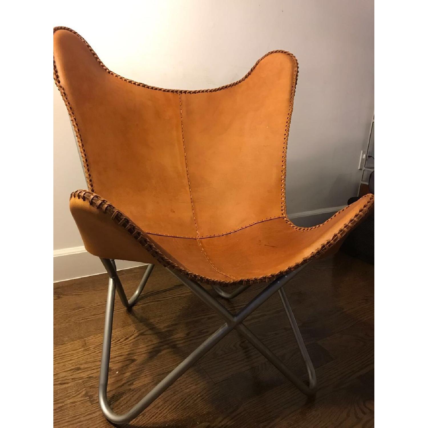 CB2 Leather Butterfly Chair in Brown AptDeco