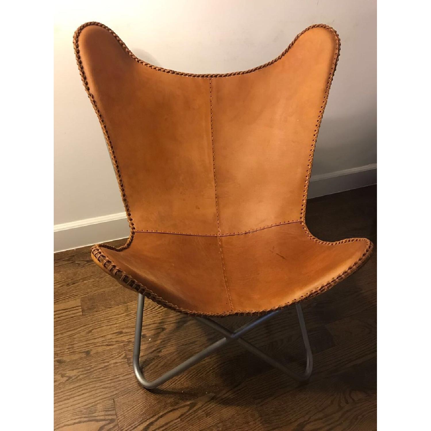 CB2 Leather Butterfly Chair in Brown AptDeco