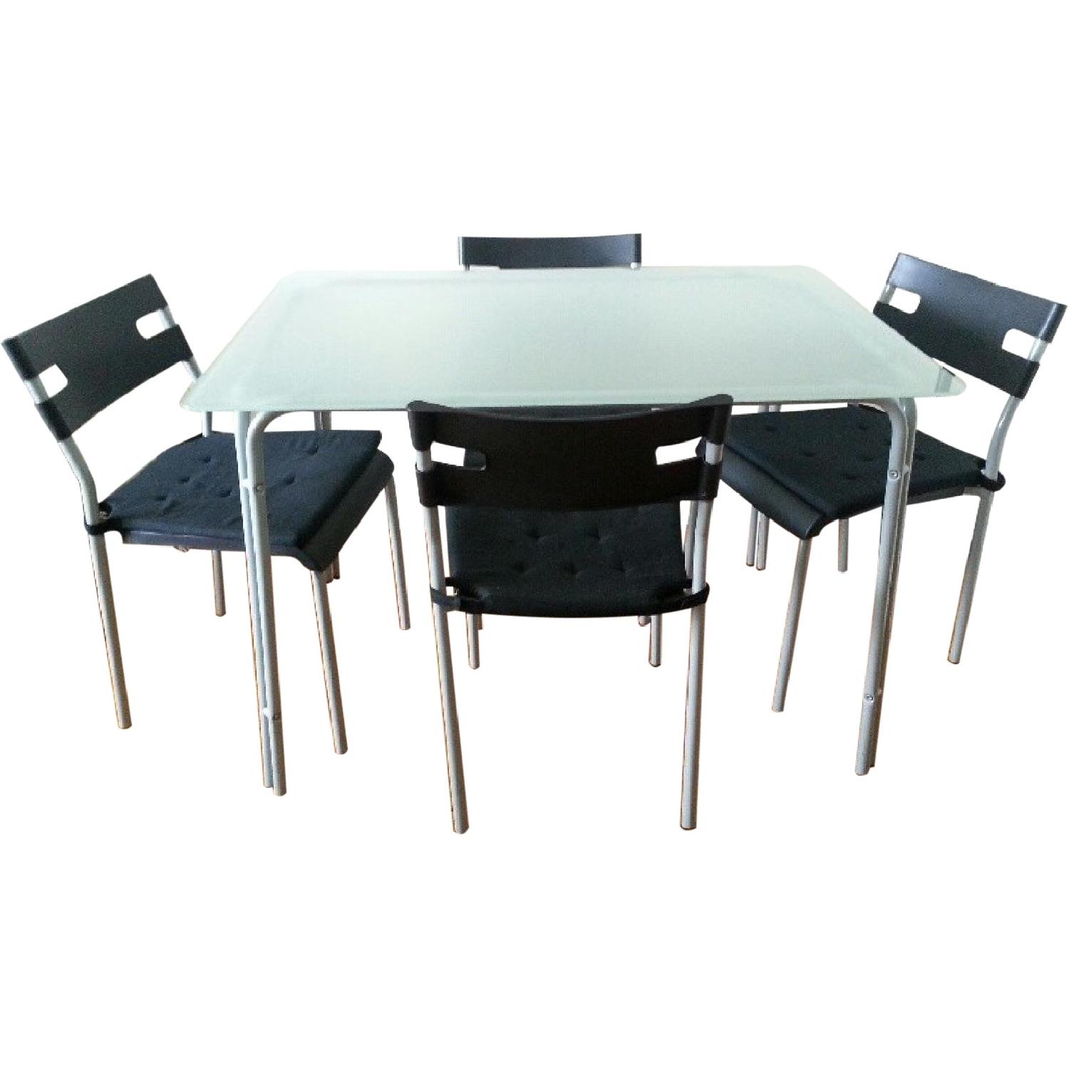 Ikea Dining Table w/ 4 Chiars AptDeco