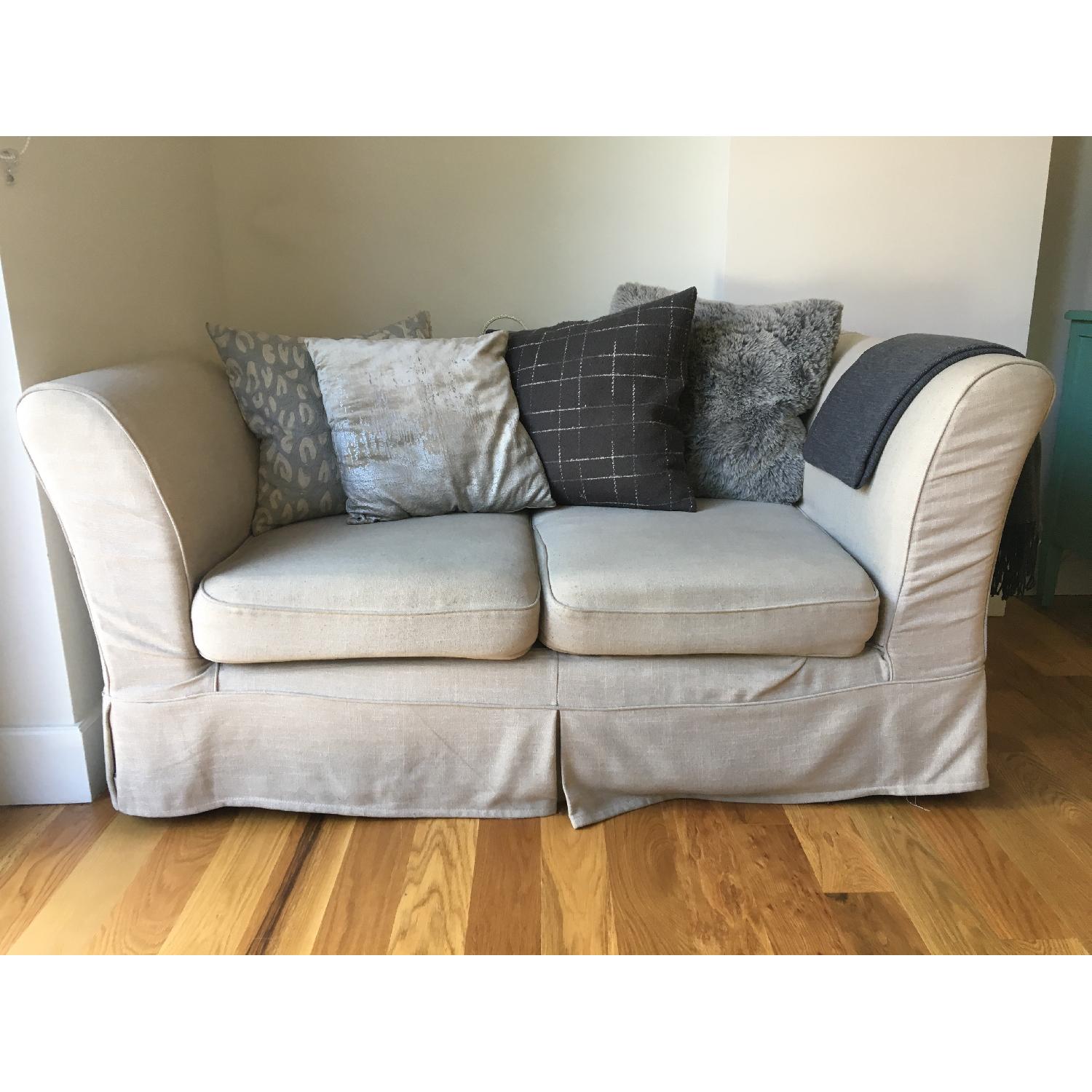 Pier 1 Beige Slipcovered Loveseat - image-1