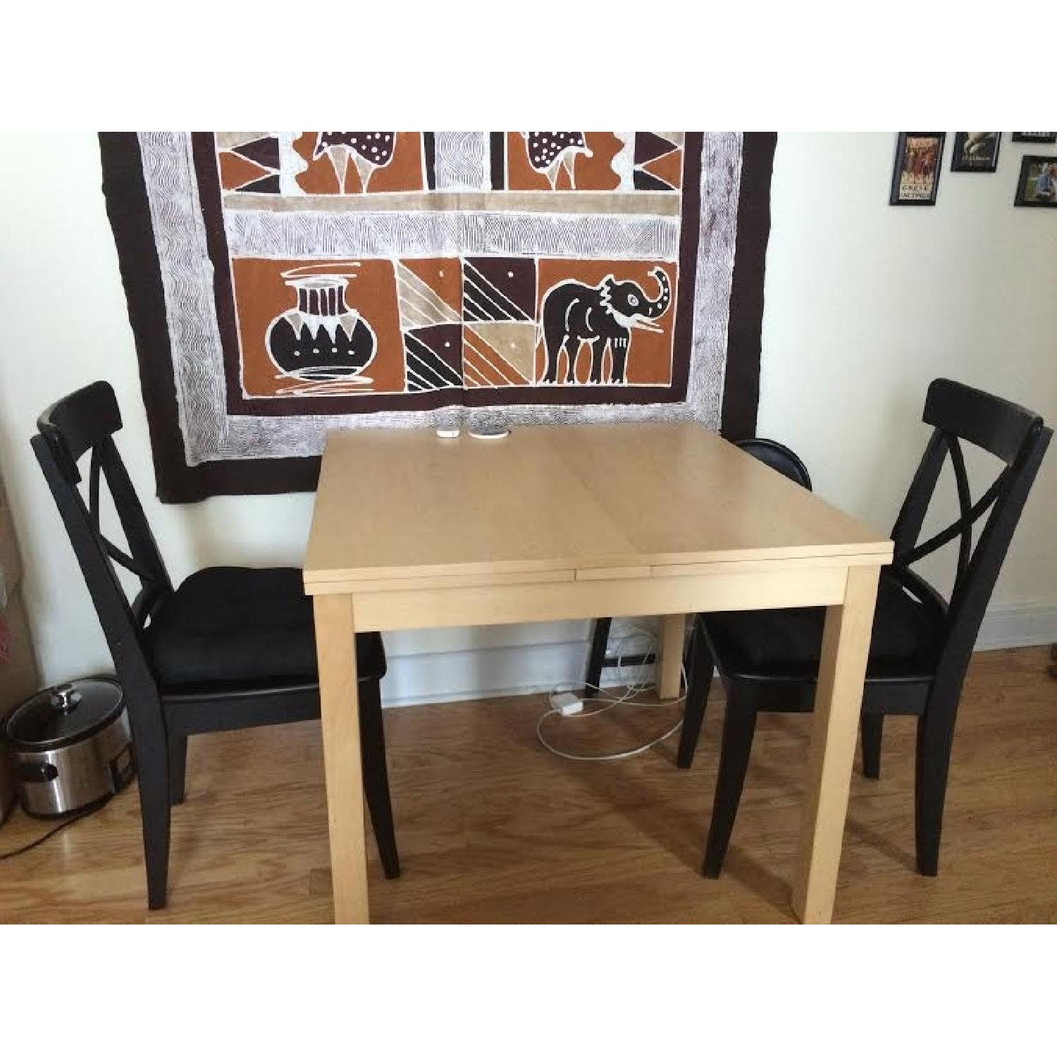 Ikea Bjursta Expandable Dining Table w/ 3 Chairs - image-1