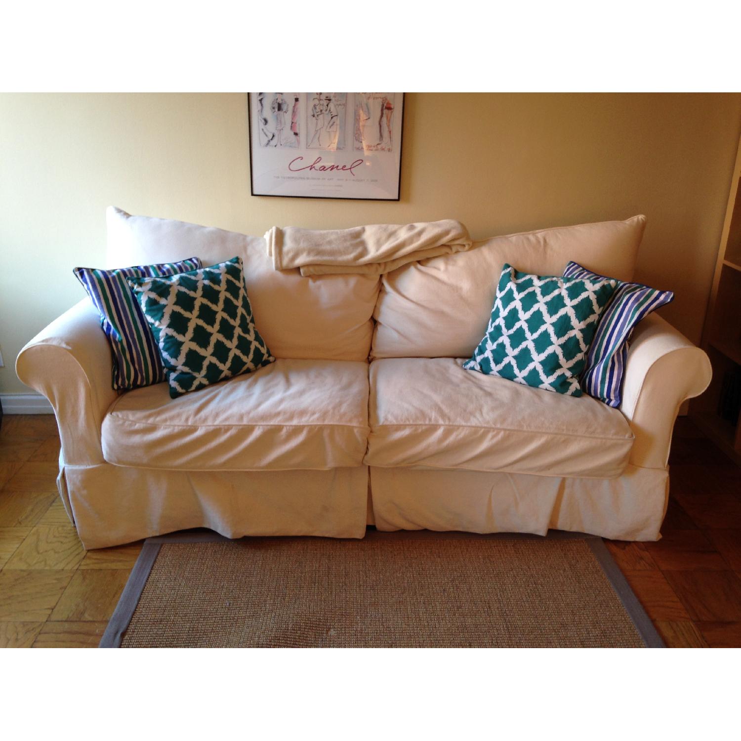 Jennifer Convertibles White Sofa with Pull Out Sofa Bed AptDeco